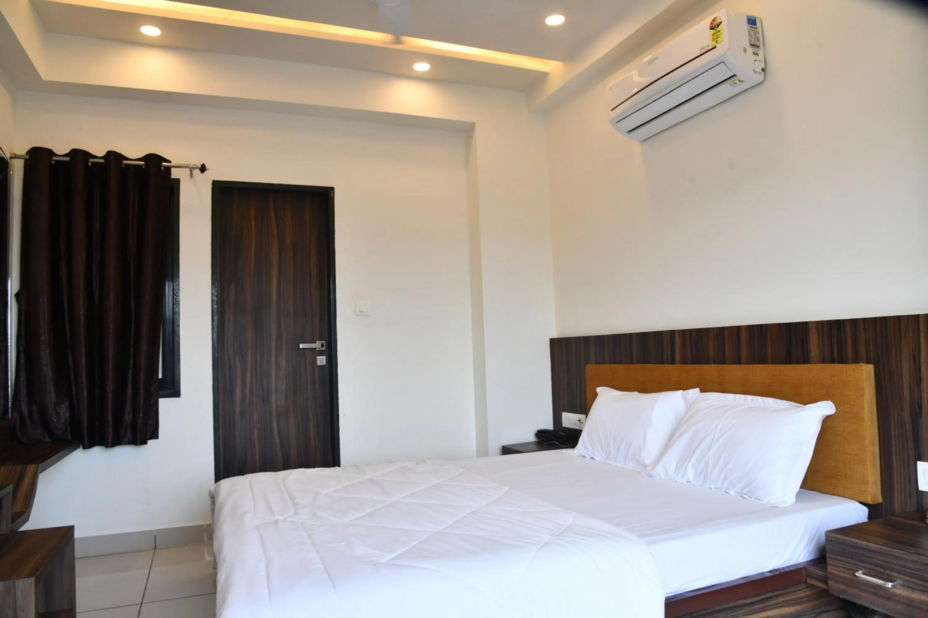 Bed in Hotel Shreeji Palace