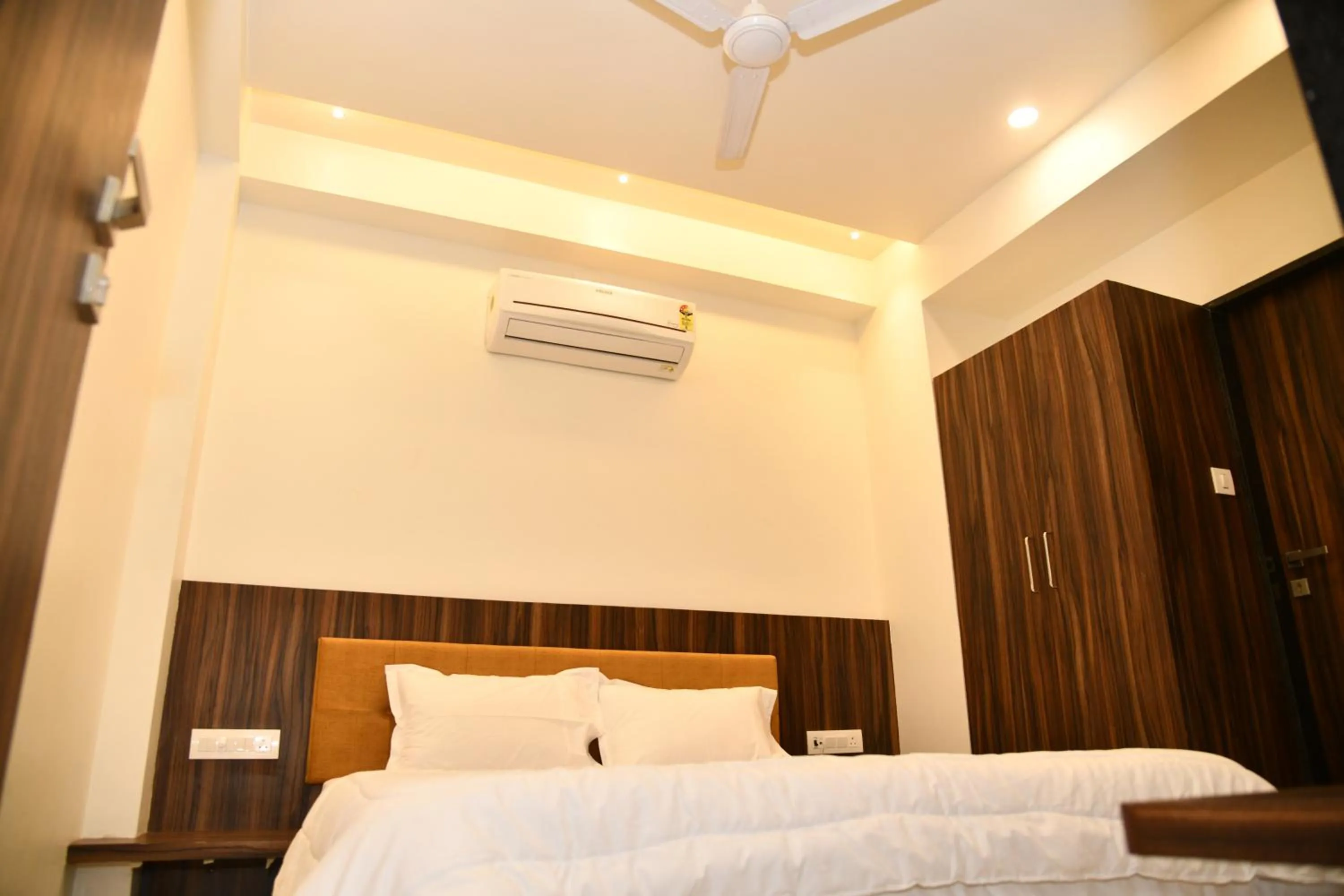 Bed in Hotel Shreeji Palace