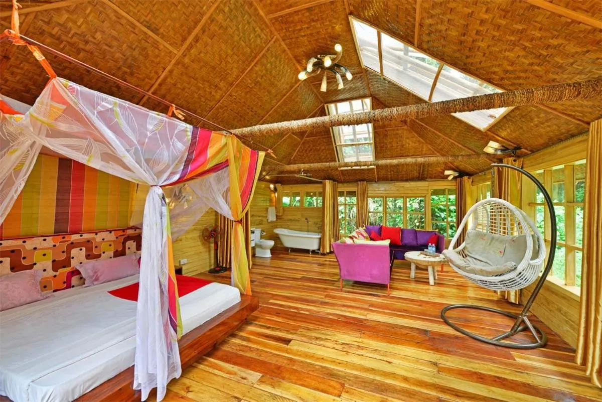 Bed in Malakai Eco Lodge