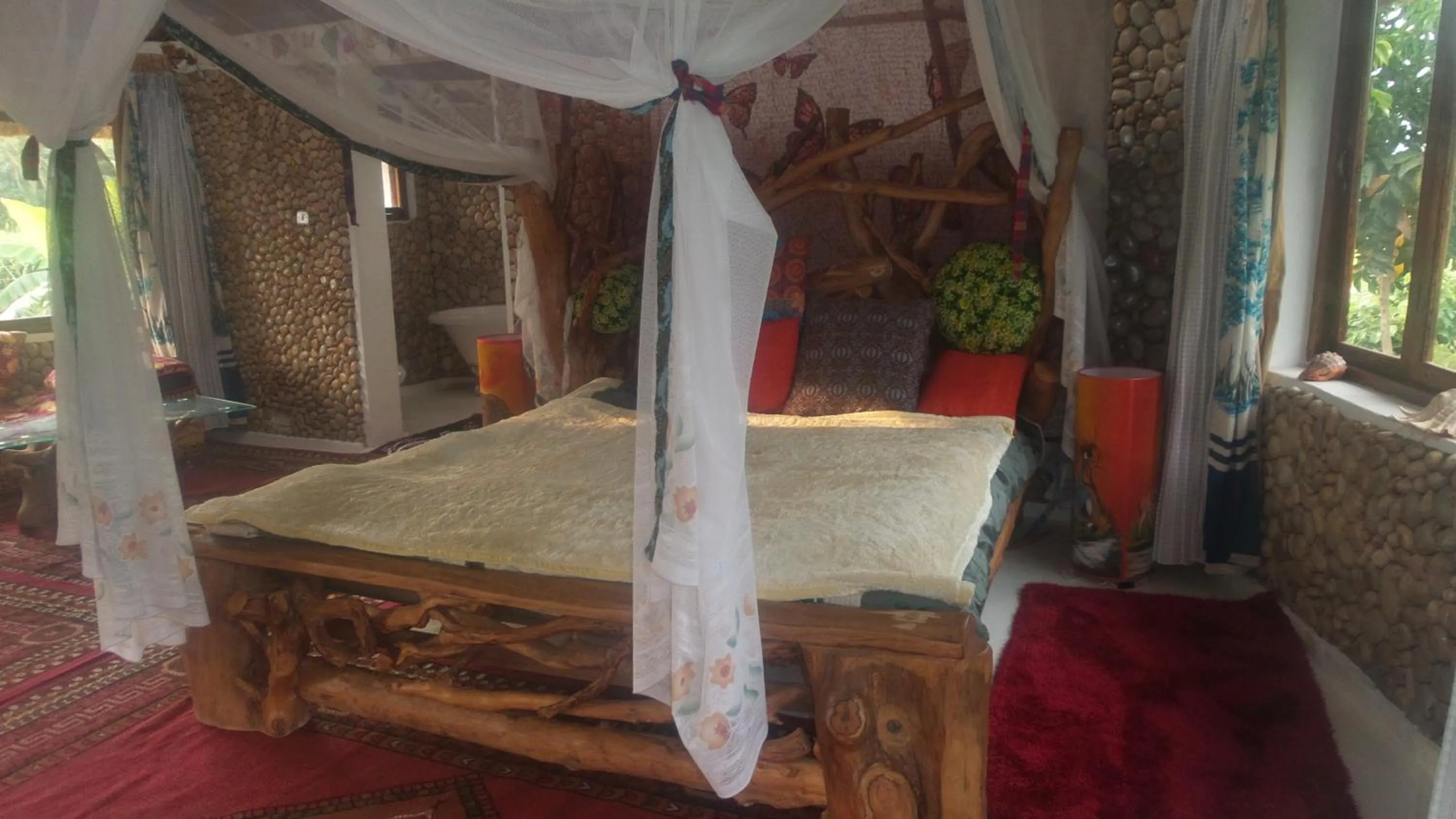 Bed in Malakai Eco Lodge