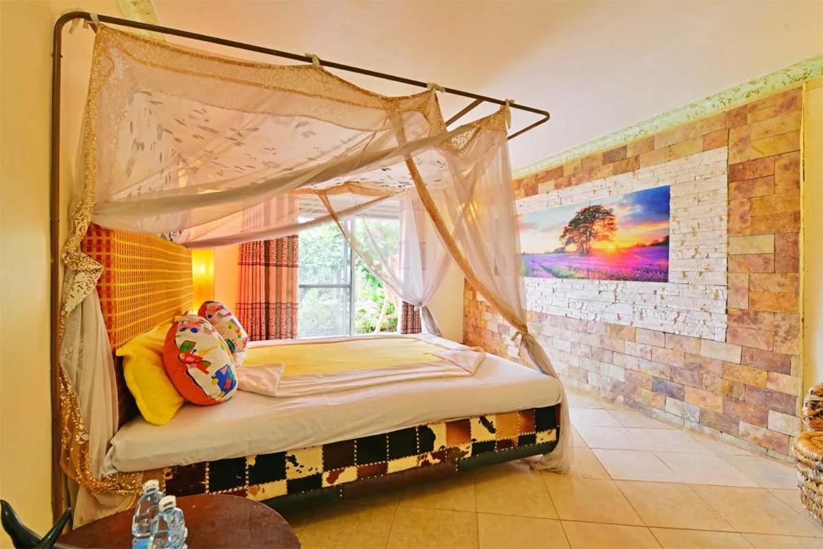 Bed in Malakai Eco Lodge