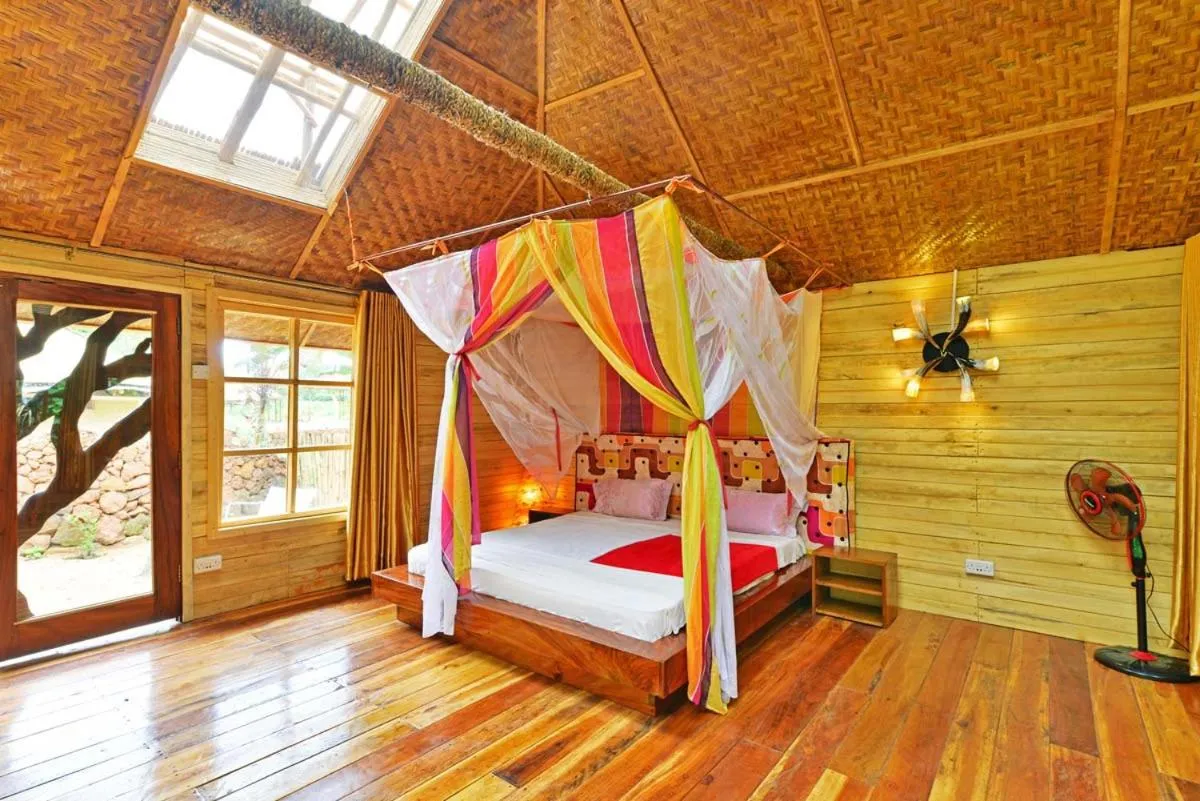 Bed in Malakai Eco Lodge