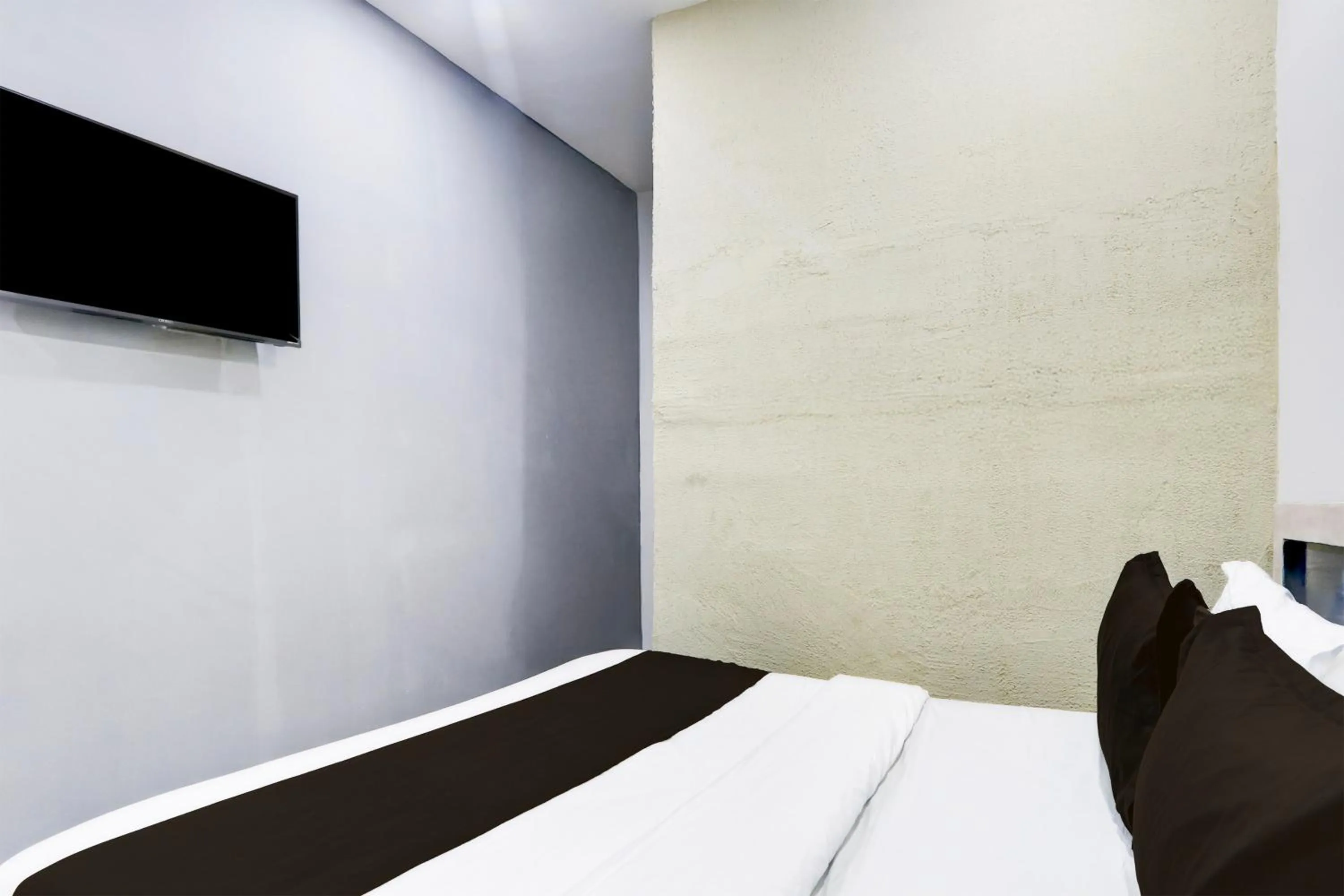 Bedroom in Hotel O by OYO Tara Grand luxury Rooms