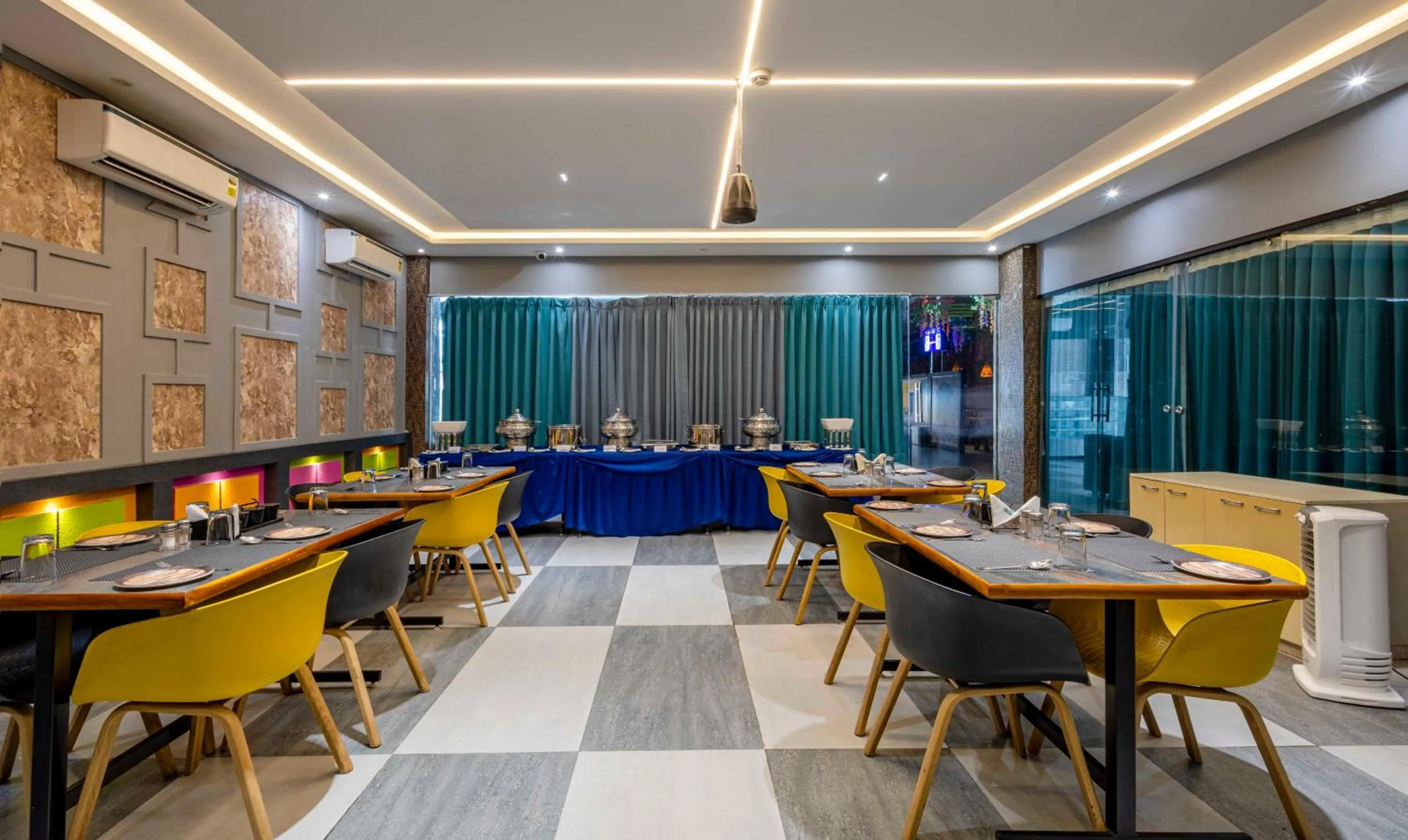 Dining area in Treebo Imperia, Kommadi