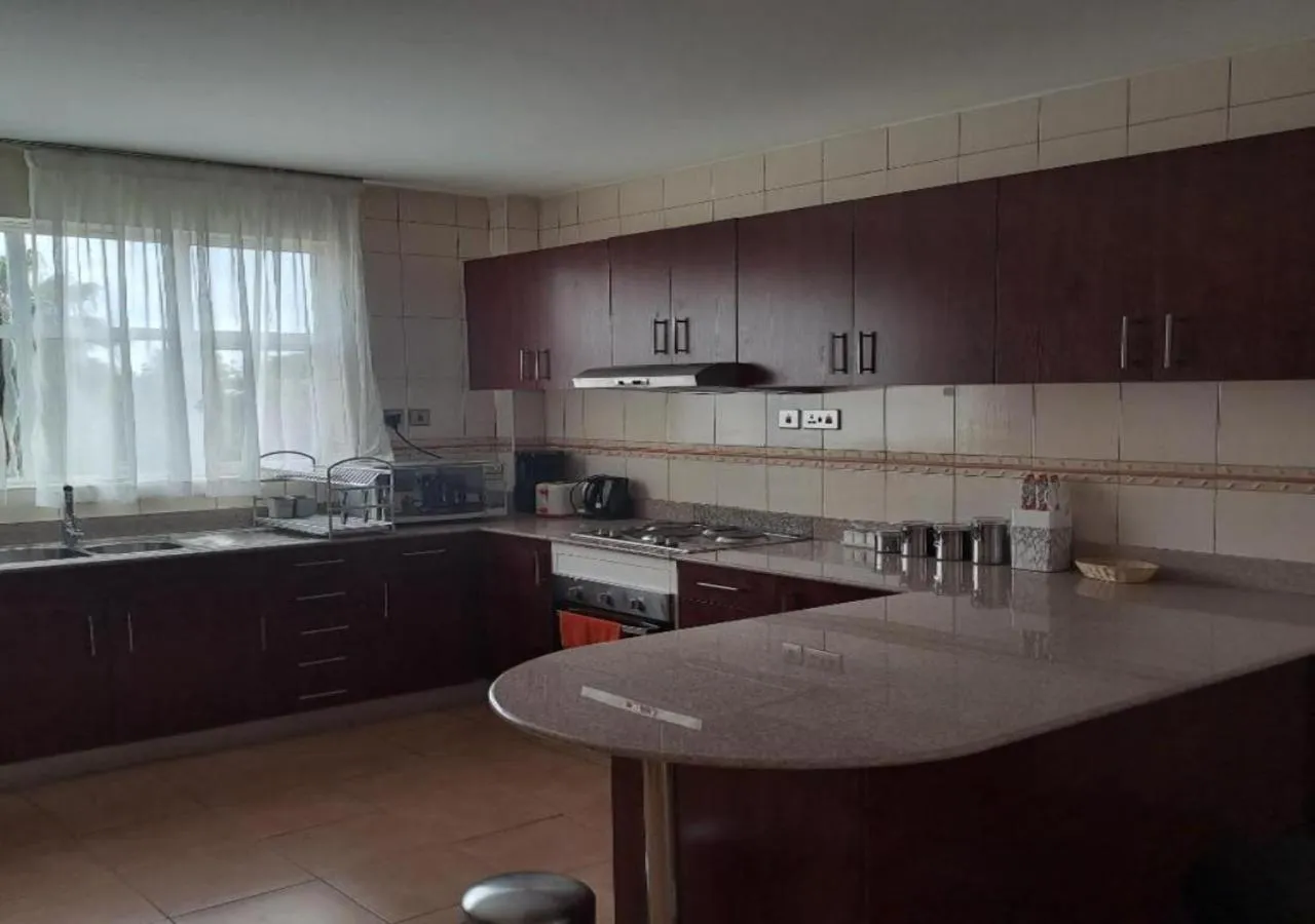 Kitchen or kitchenette in Golf View Serviced Apartments