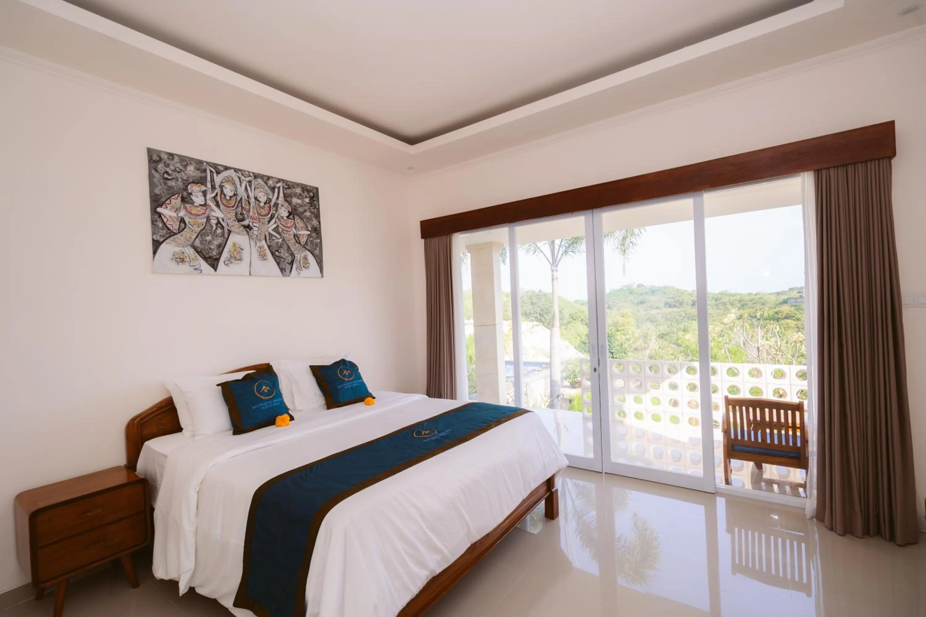 Bed in Kelingking Paradise Suites Villa
