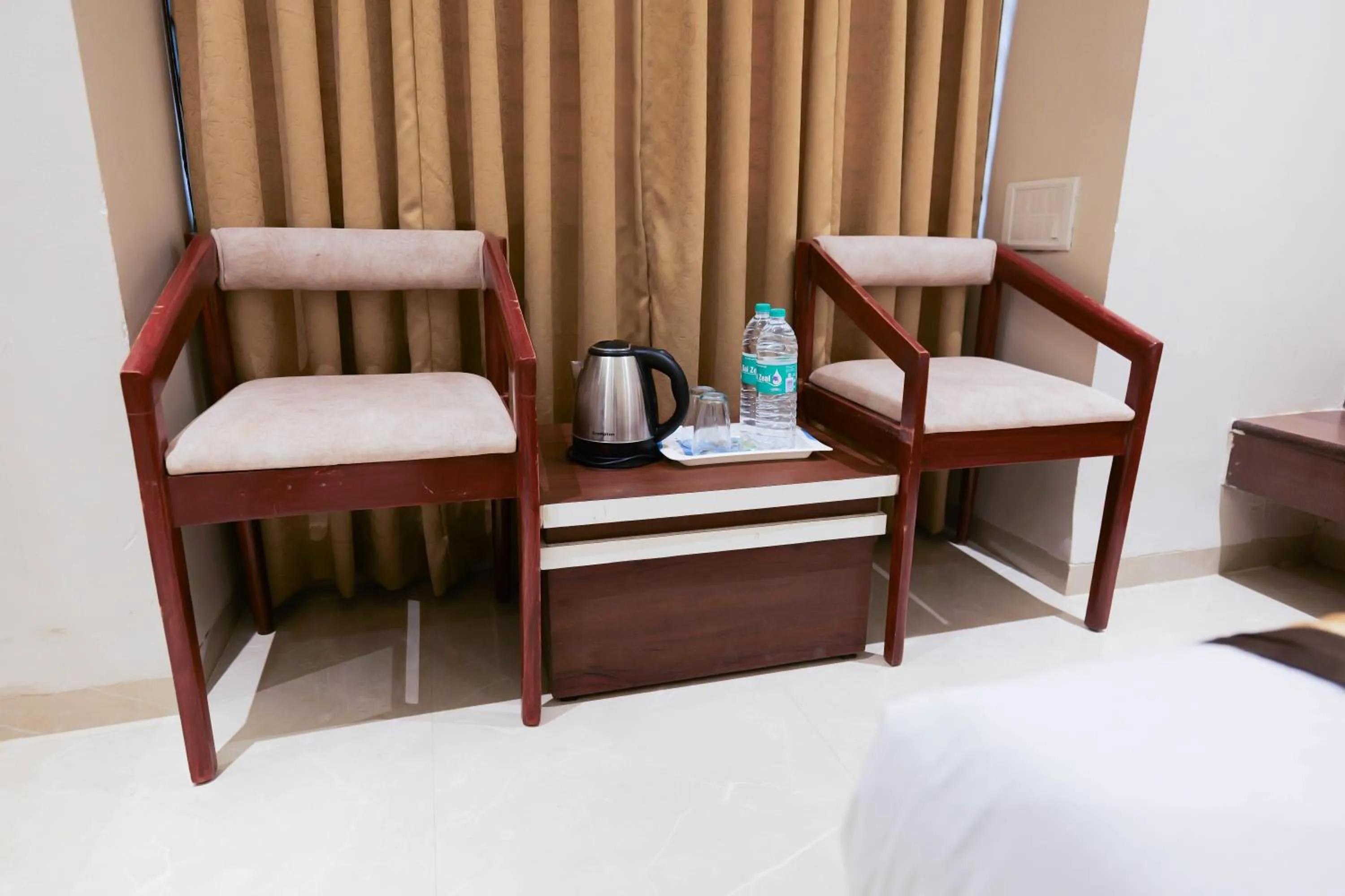 Seating area, Bed in Hotel Laxmibai Palace- Only 300 miter from Sai Baba Temple!!!!