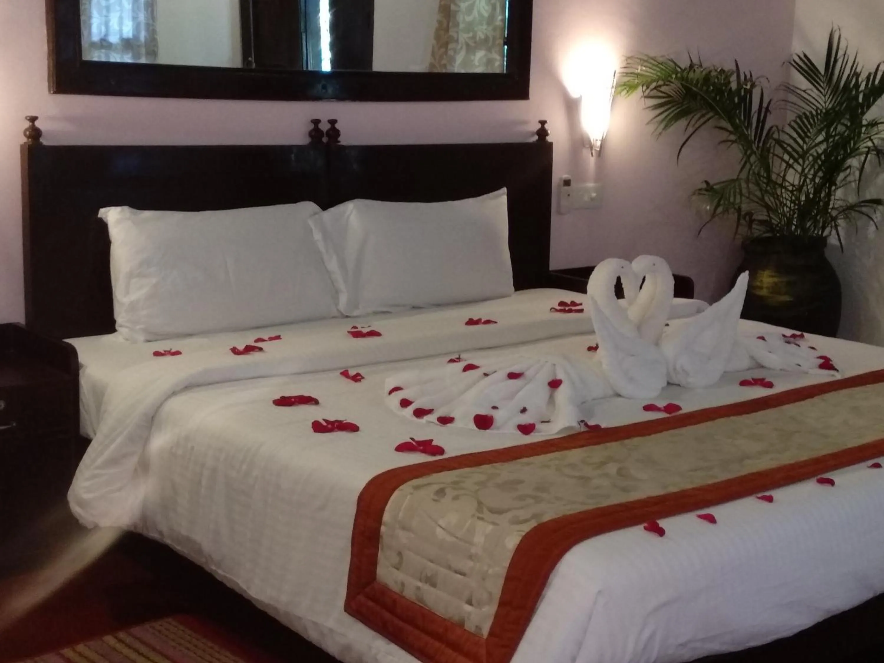 Bed in Marari Umapathi Beach Villa