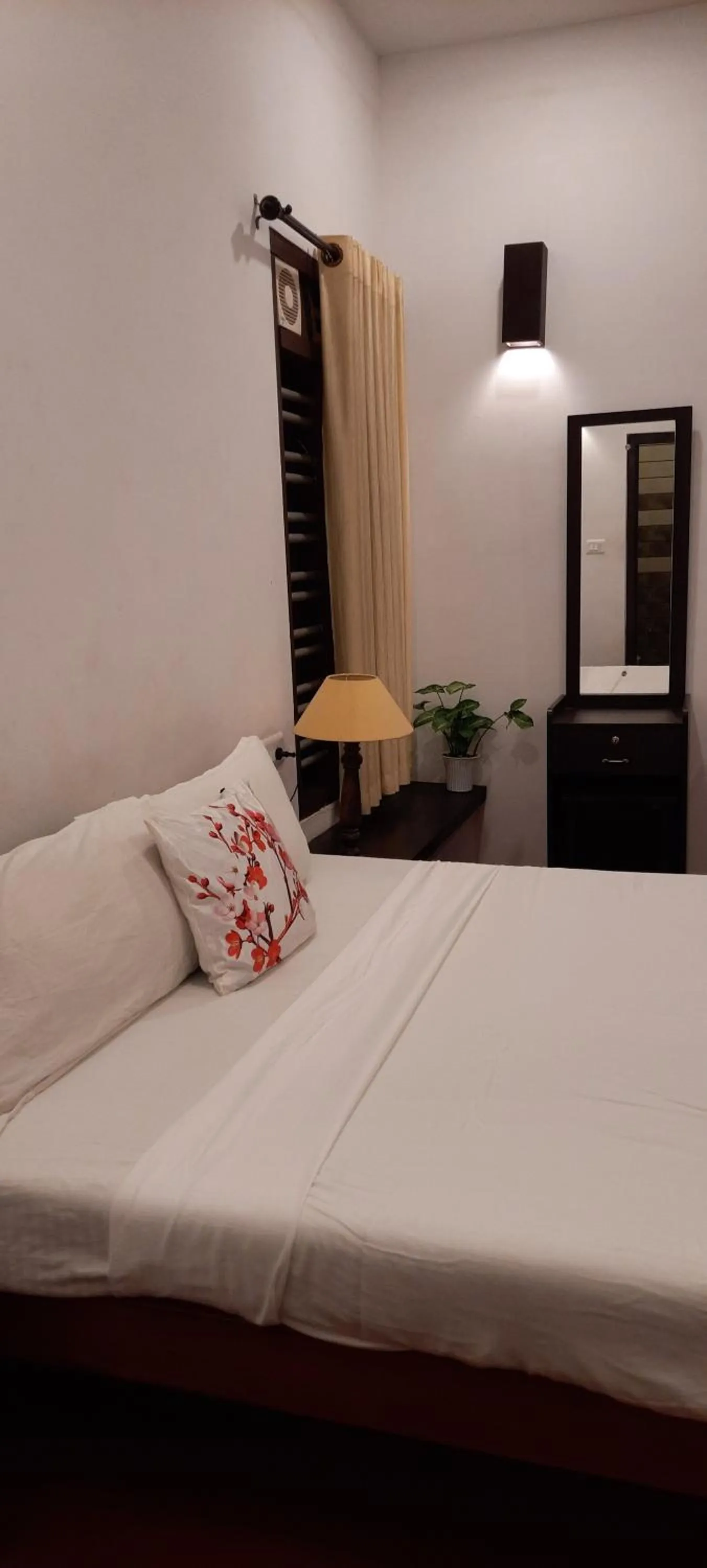 Bed in Marari Umapathi Beach Villa