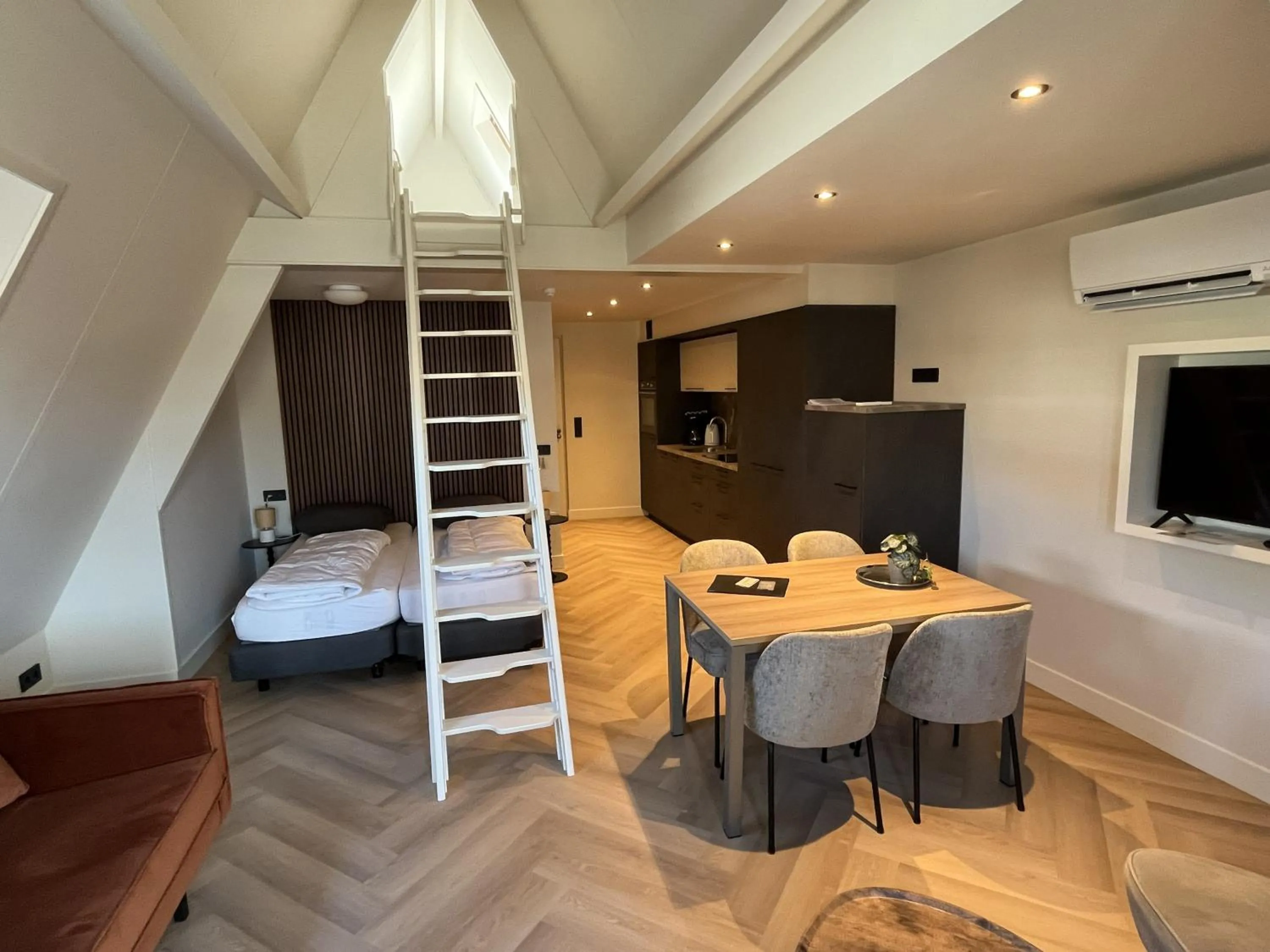 Living room, Bed in Appartementen het Centrum