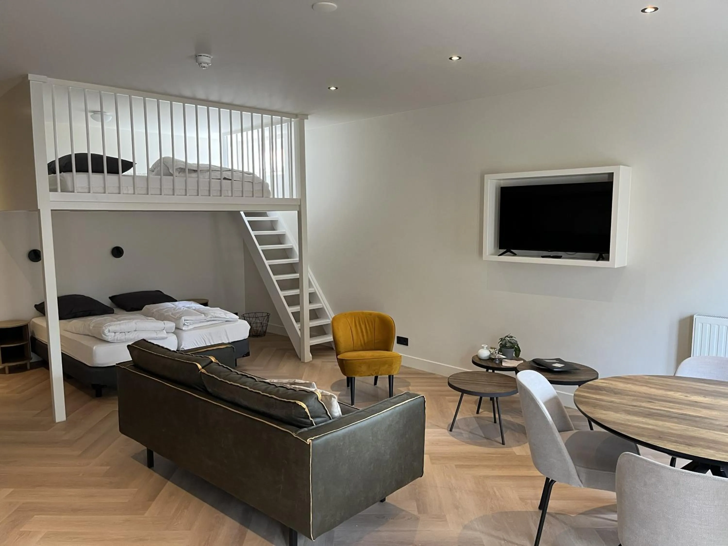 Living room, Bed in Appartementen het Centrum