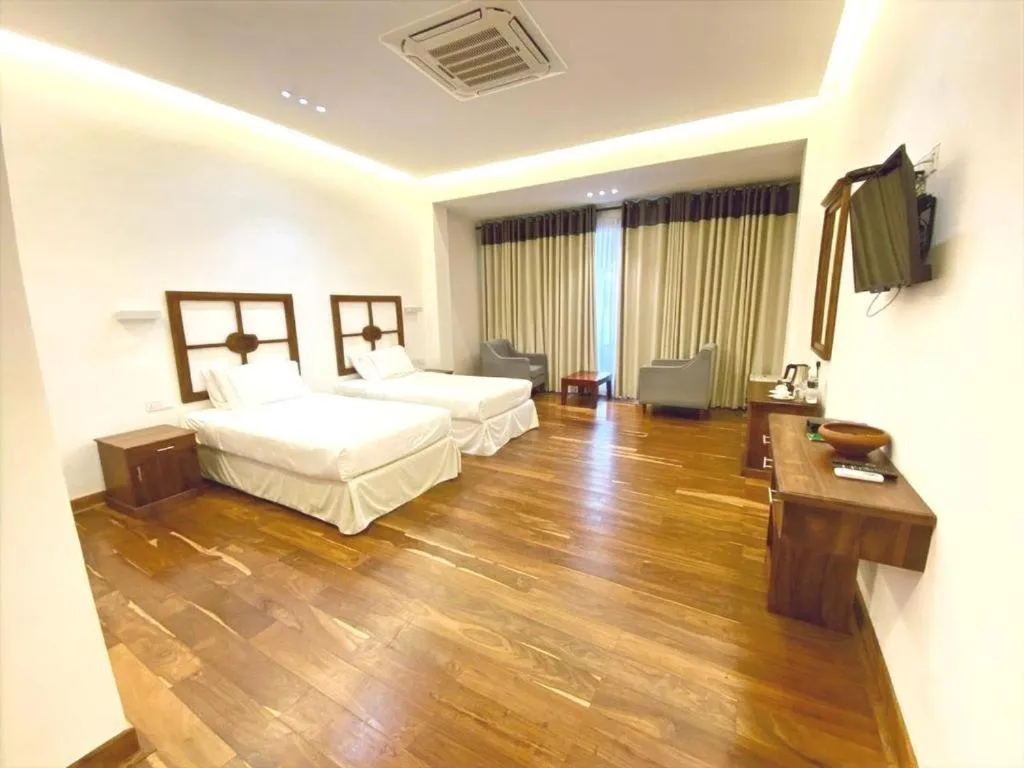 Photo of the whole room, Bed in Avasta Resort Wijaya Leisure