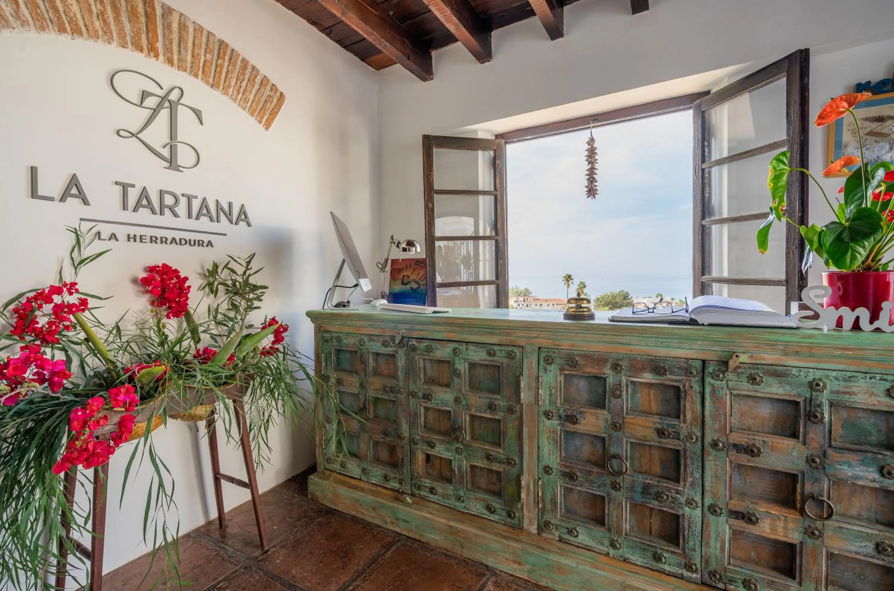 Lobby or reception in La Tartana Hotel Boutique