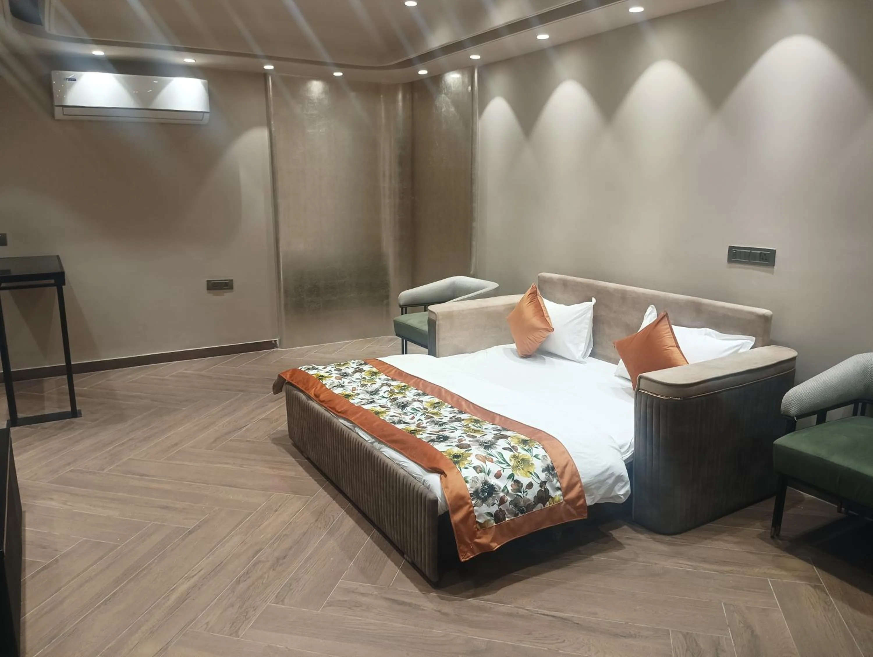 Bed in Qotel Signature Coleman Janakpuri