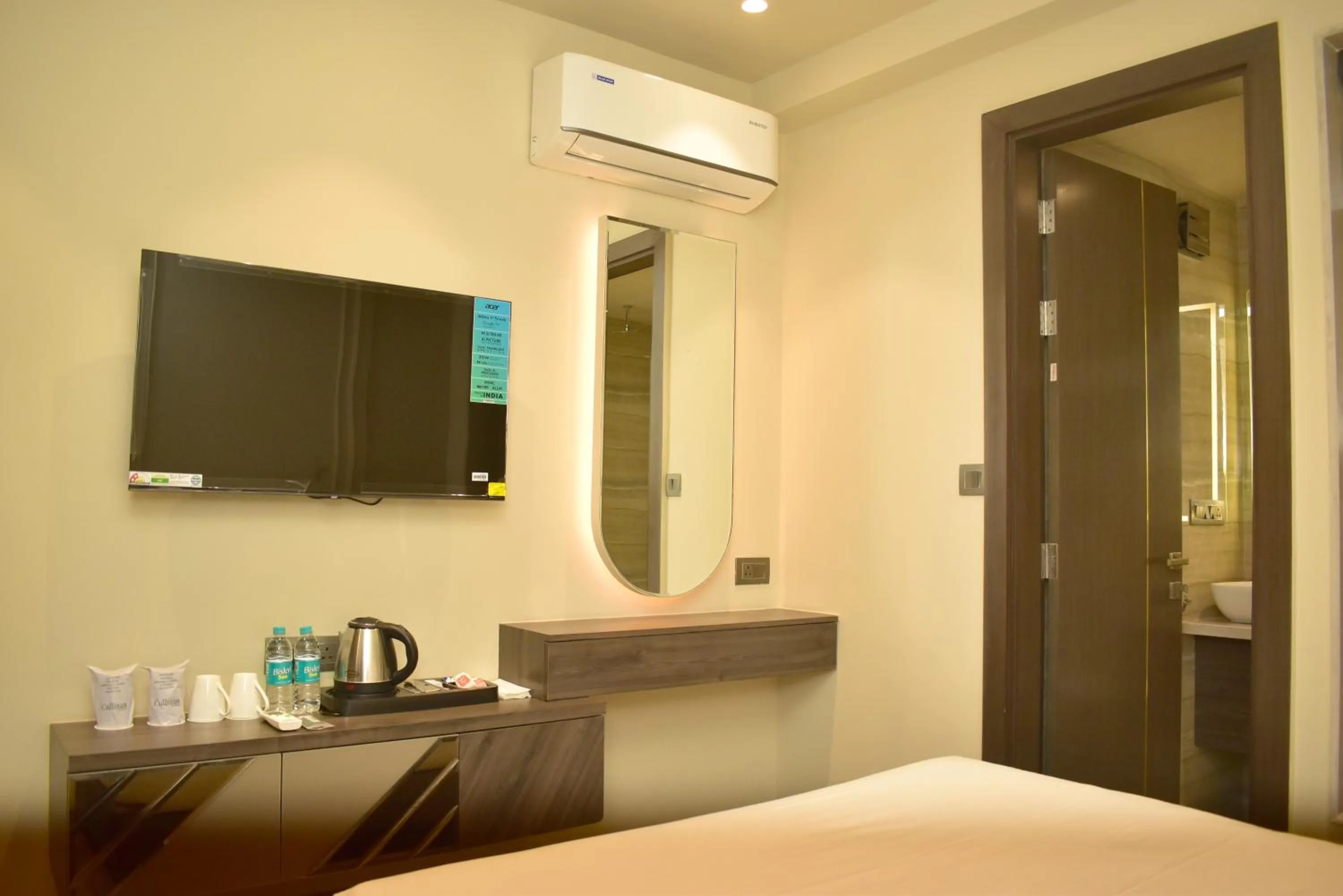 Bed in Qotel Signature Coleman Janakpuri