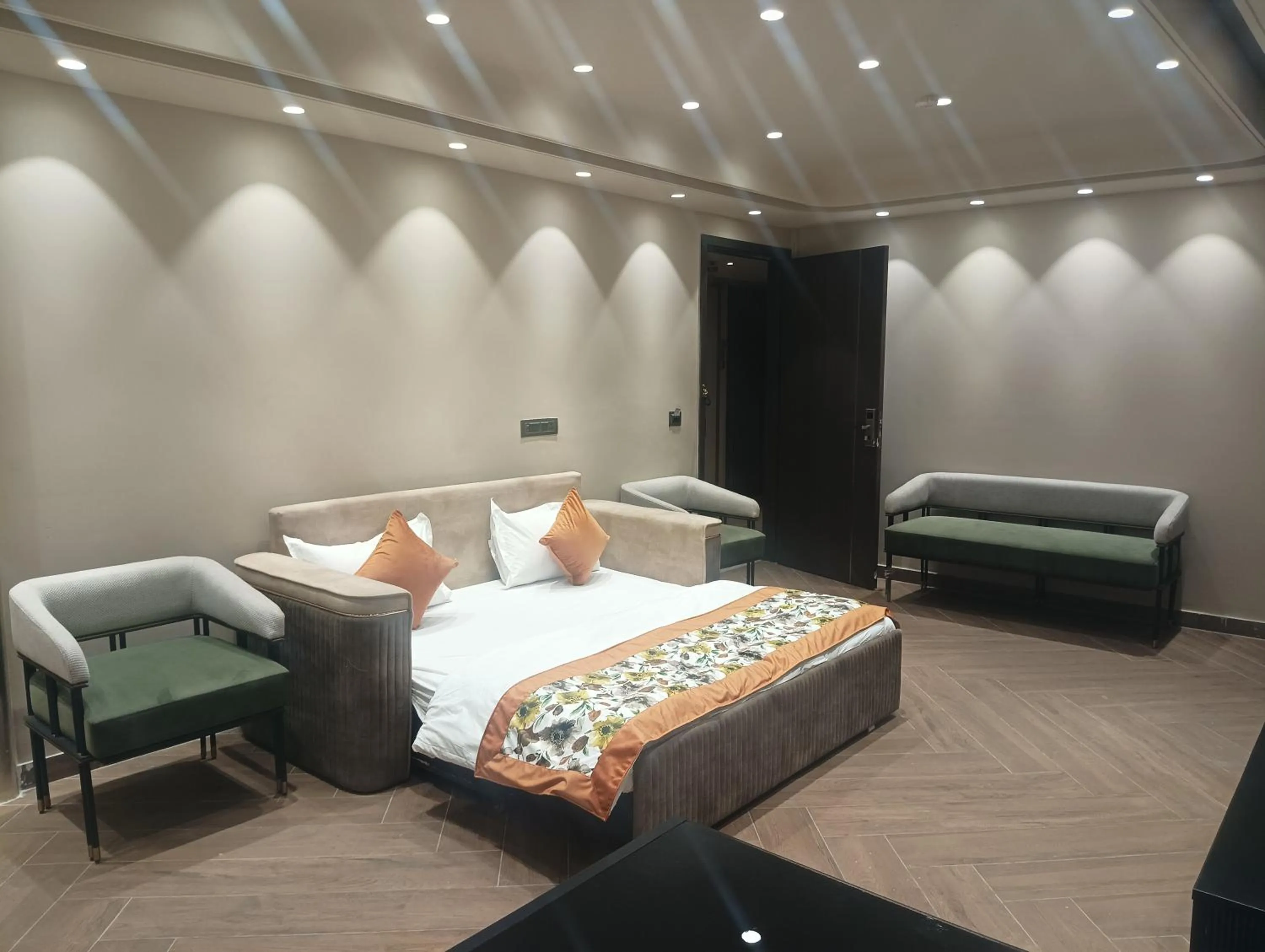 Bed in Qotel Signature Coleman Janakpuri