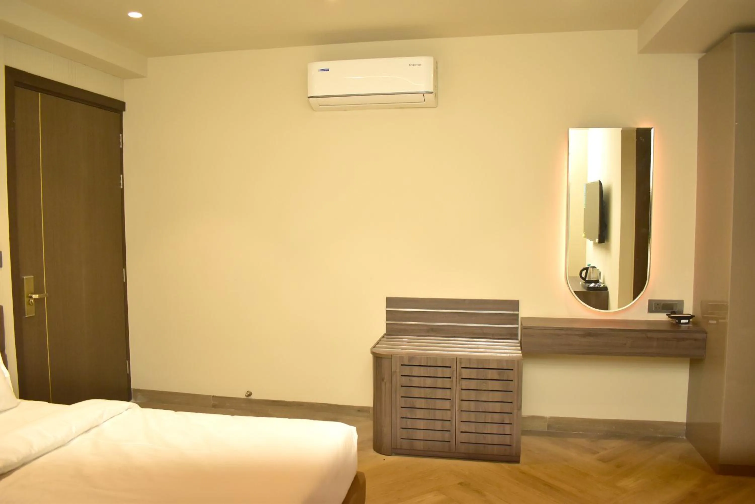 Bed in Qotel Signature Coleman Janakpuri