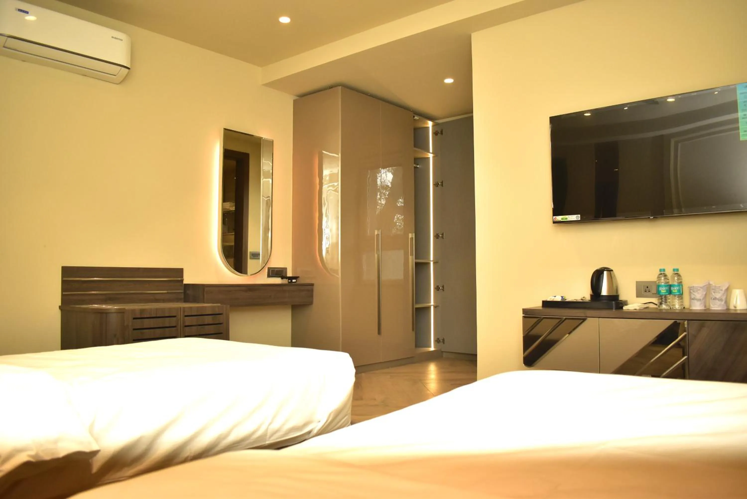 Bed in Qotel Signature Coleman Janakpuri