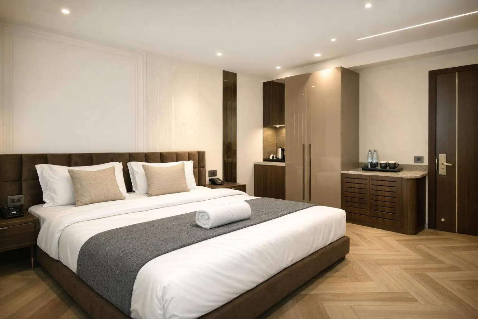 Bed in Qotel Signature Coleman Janakpuri