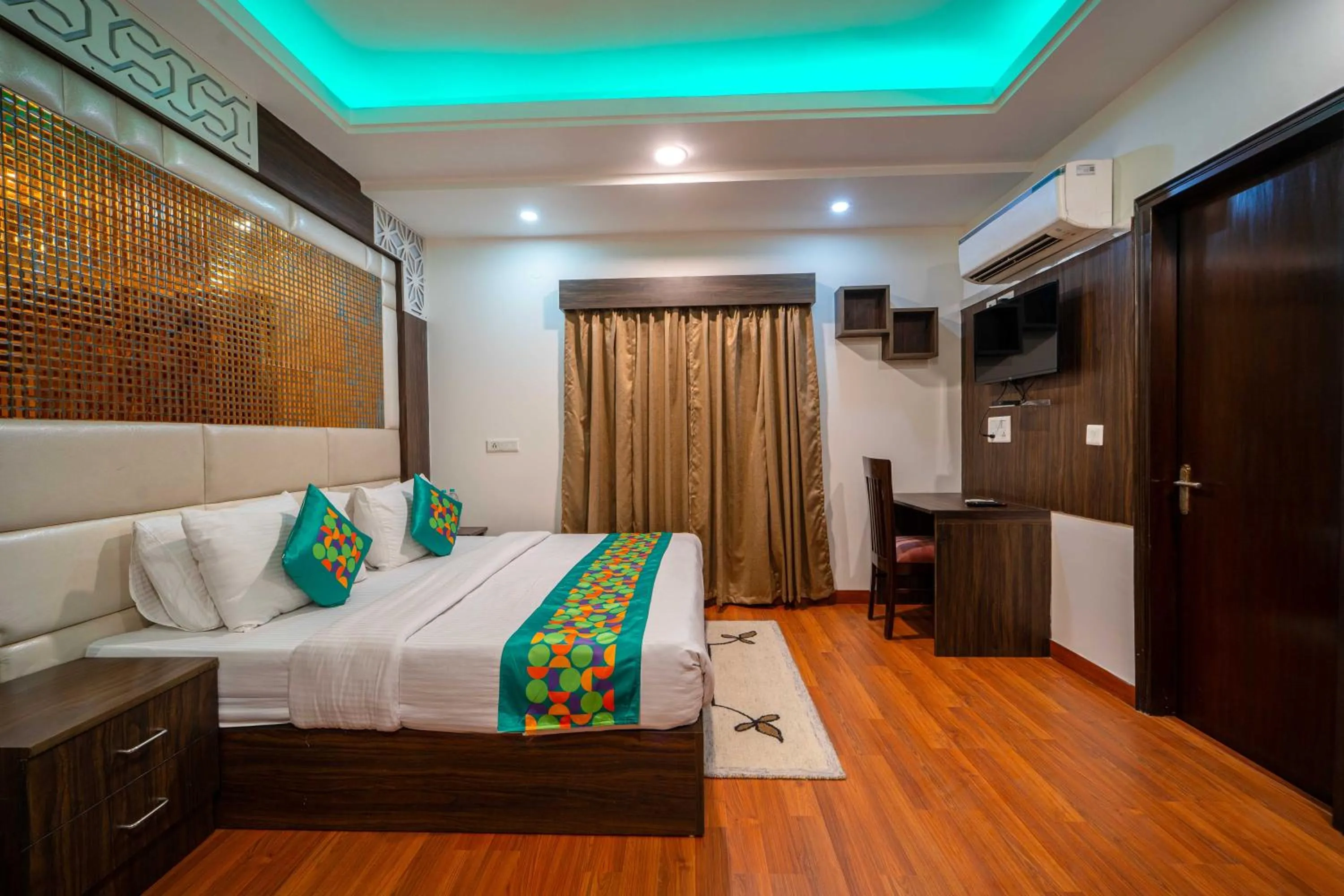 Bedroom, Bed in Treebo Marigold