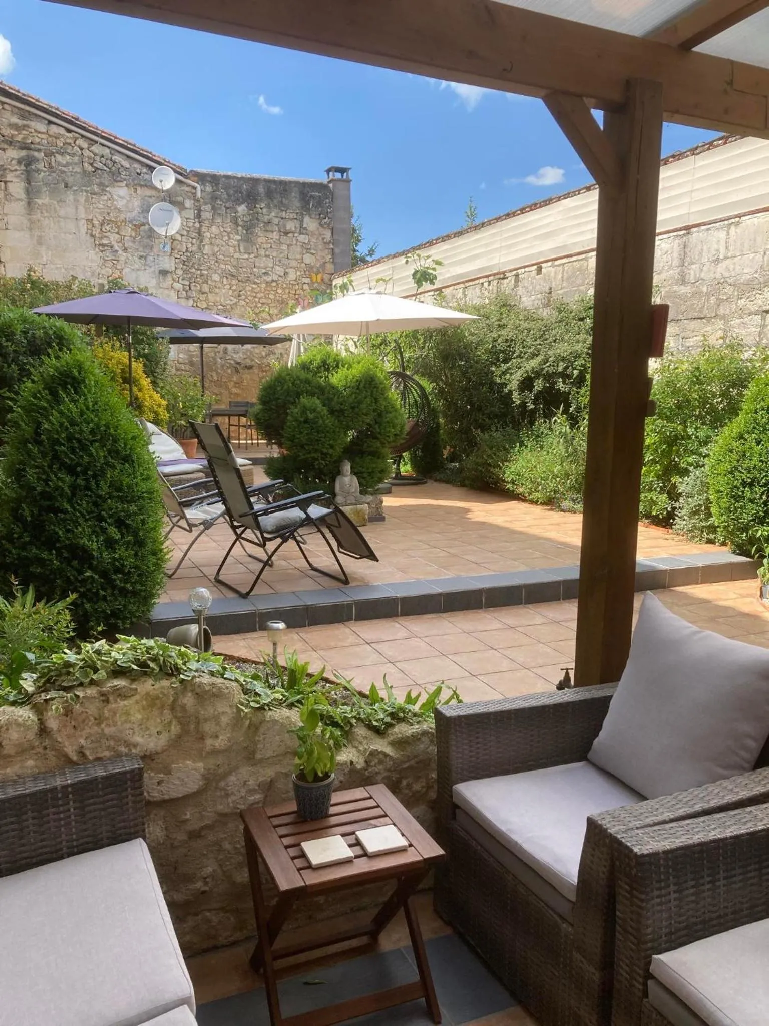 Garden in Le Patio Chambres et Tables d'Hôtes
