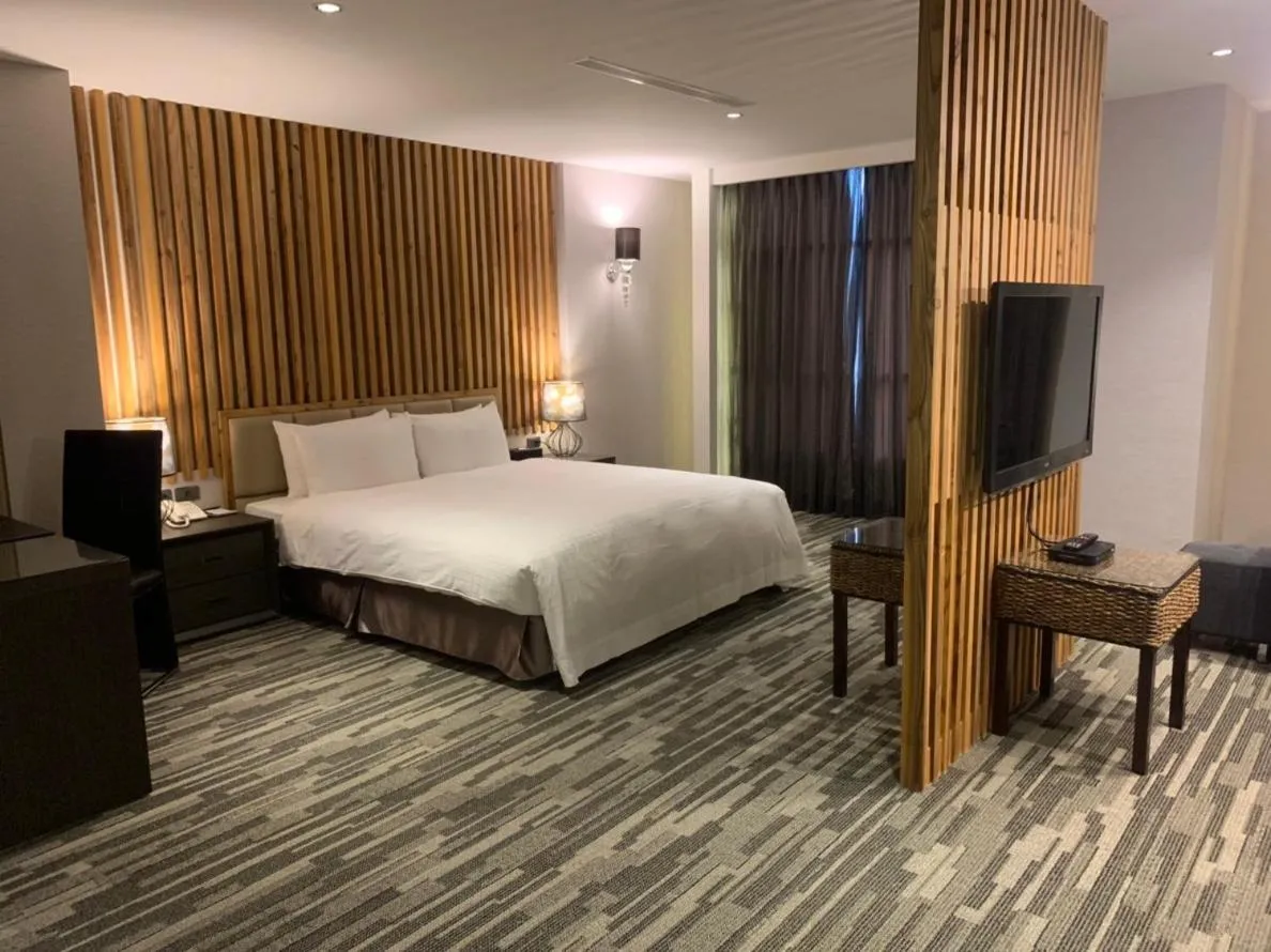 Bed in Chiayi Oriental Pearl International Hotel