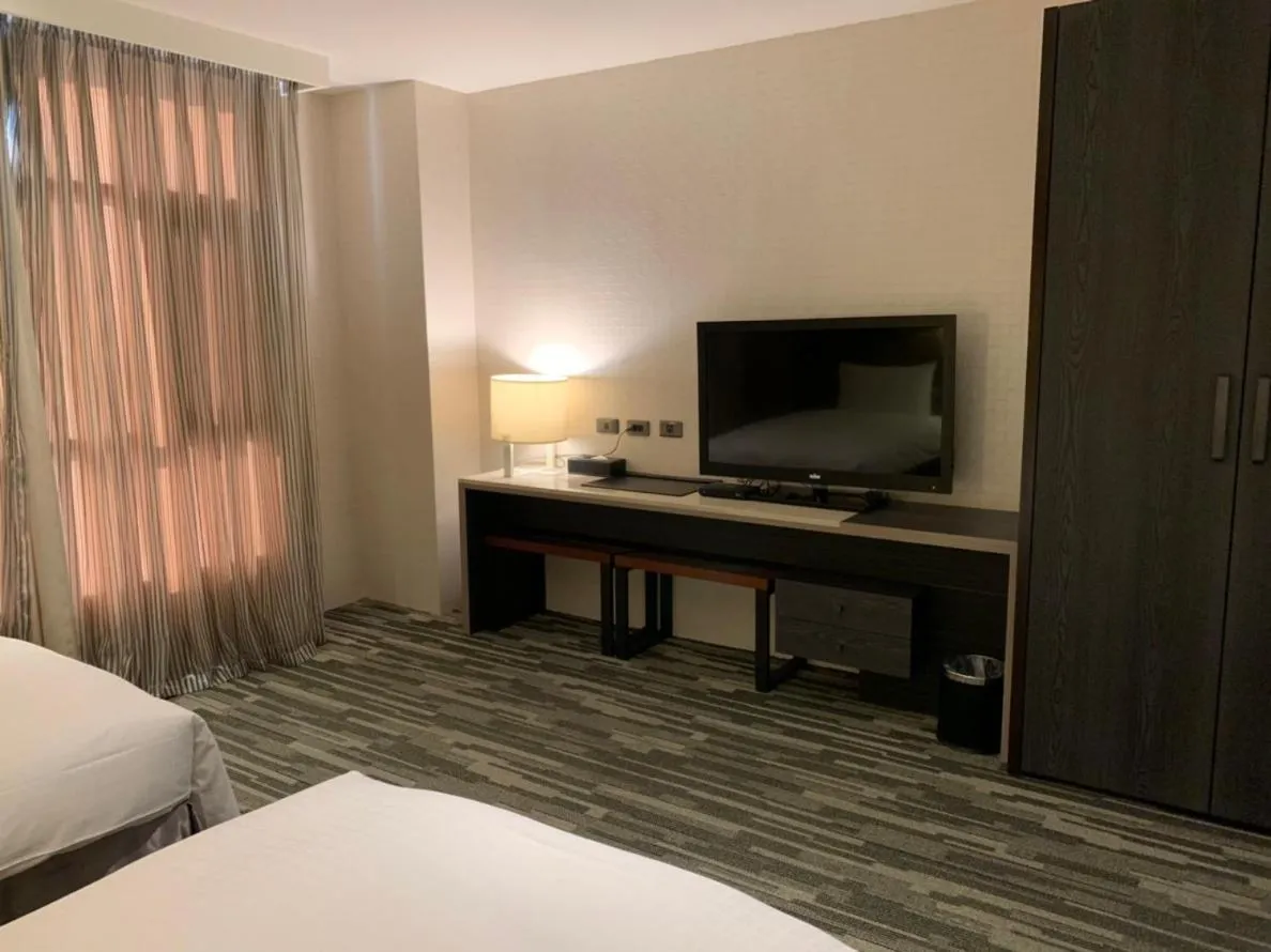 Bed in Chiayi Oriental Pearl International Hotel