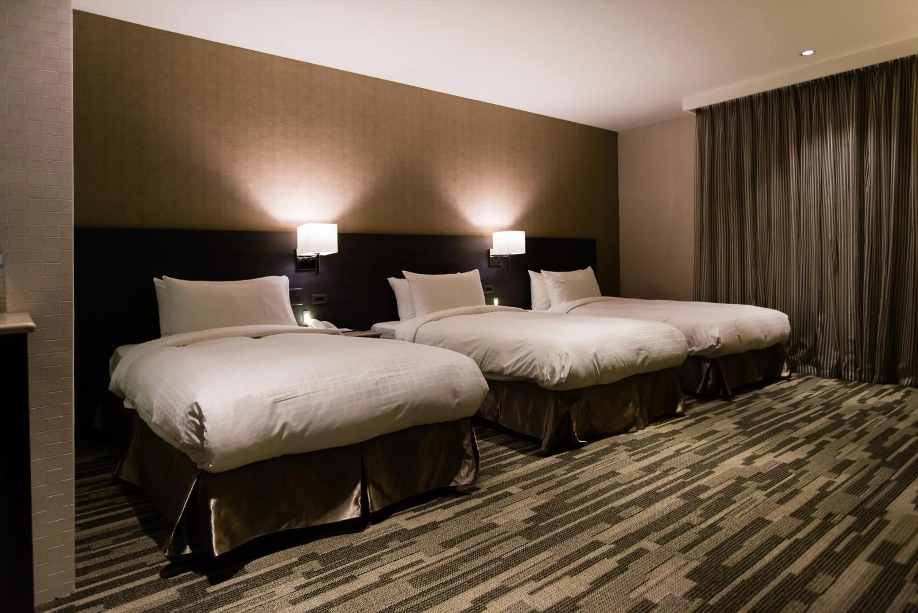 Bed in Chiayi Oriental Pearl International Hotel