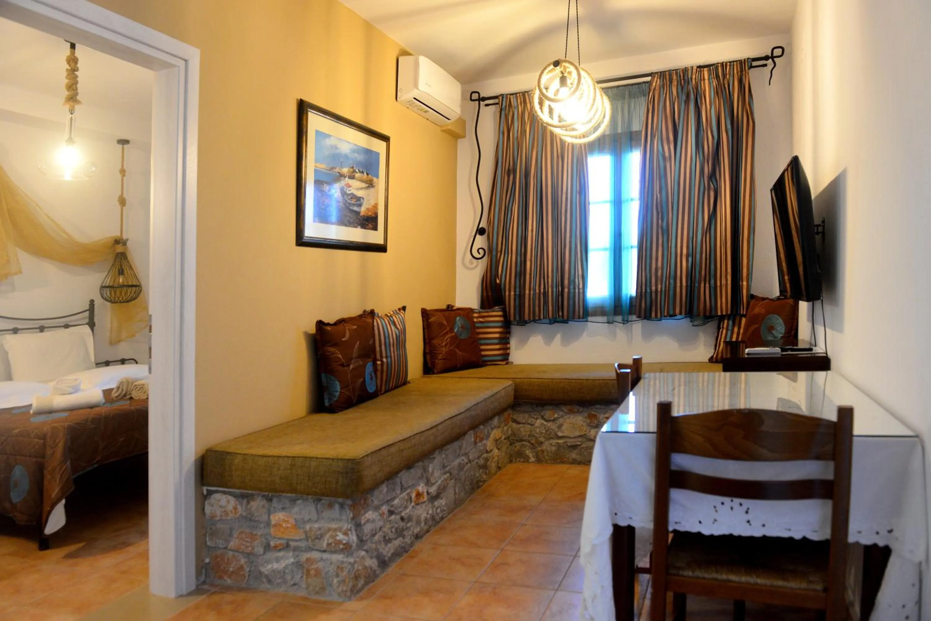 Bed in Skiathos Island Suites