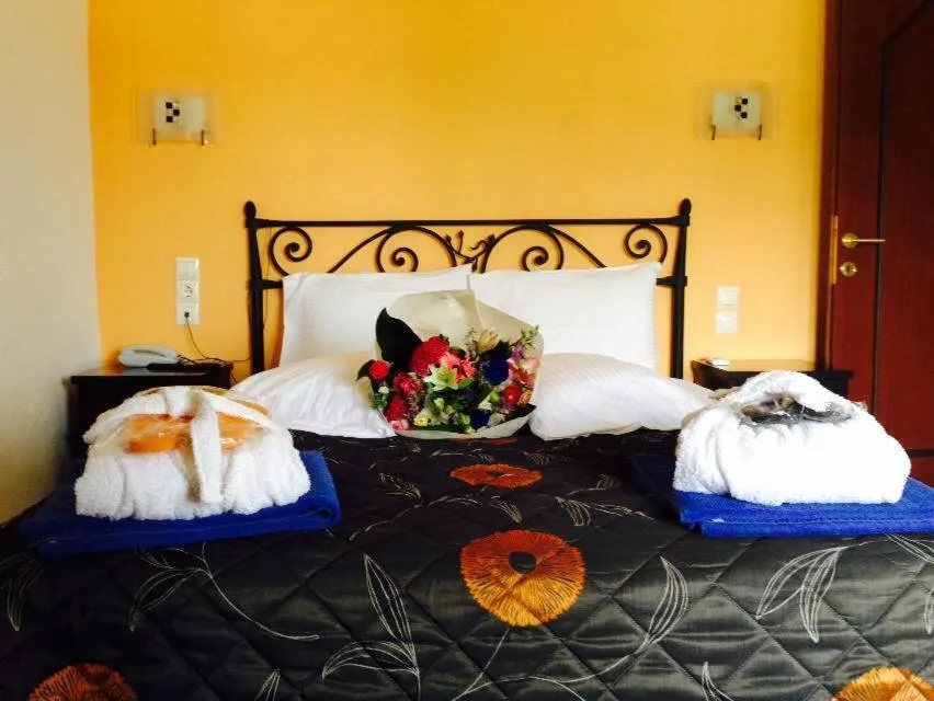 Bed in Skiathos Island Suites