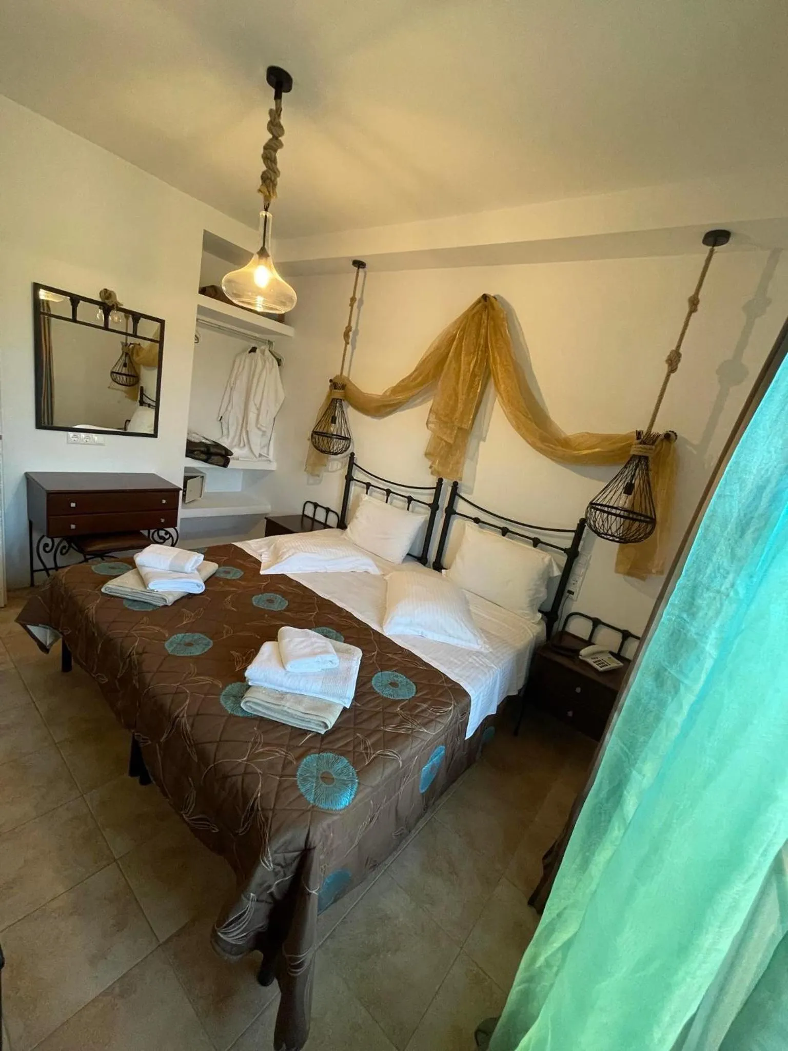 Bed in Skiathos Island Suites