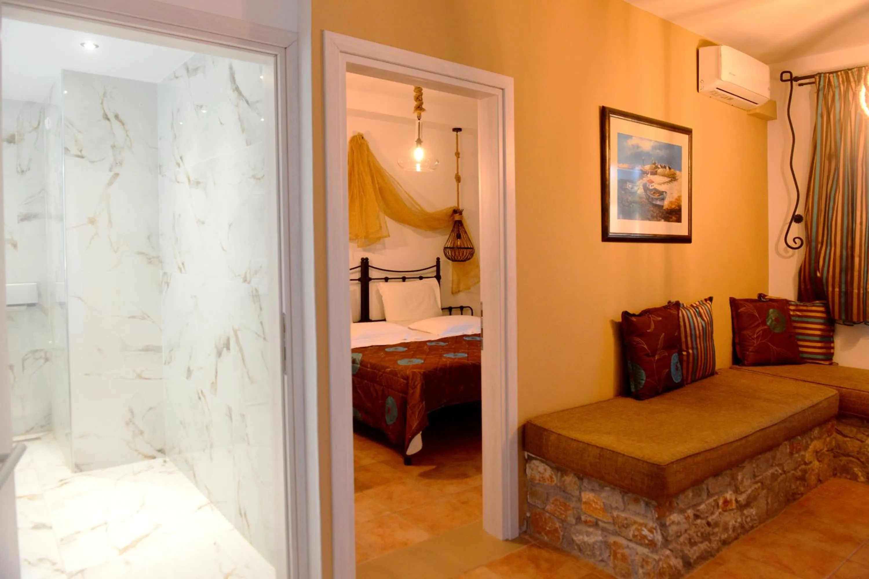 Bed in Skiathos Island Suites