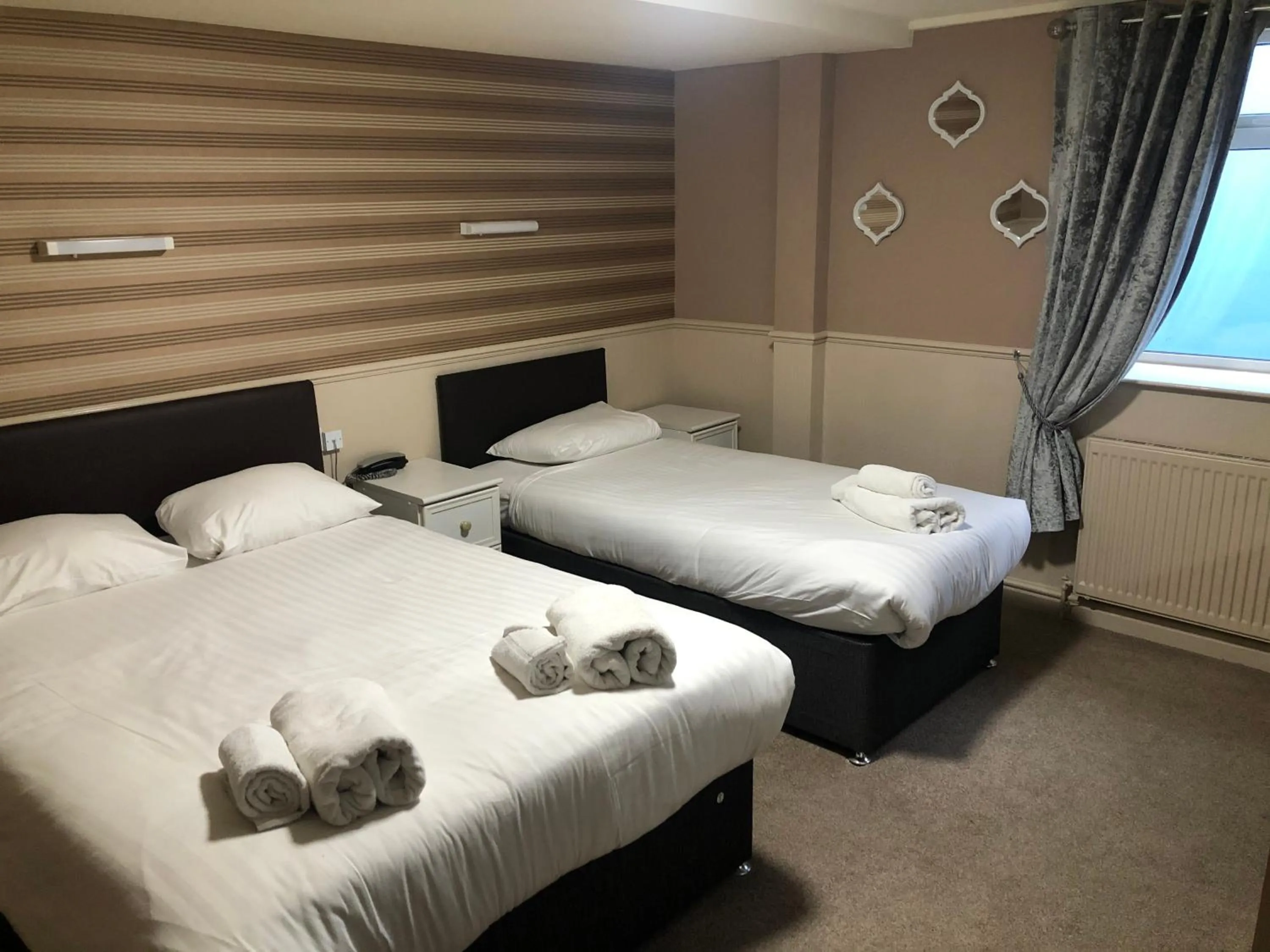 Bed in Lyndene Hotel