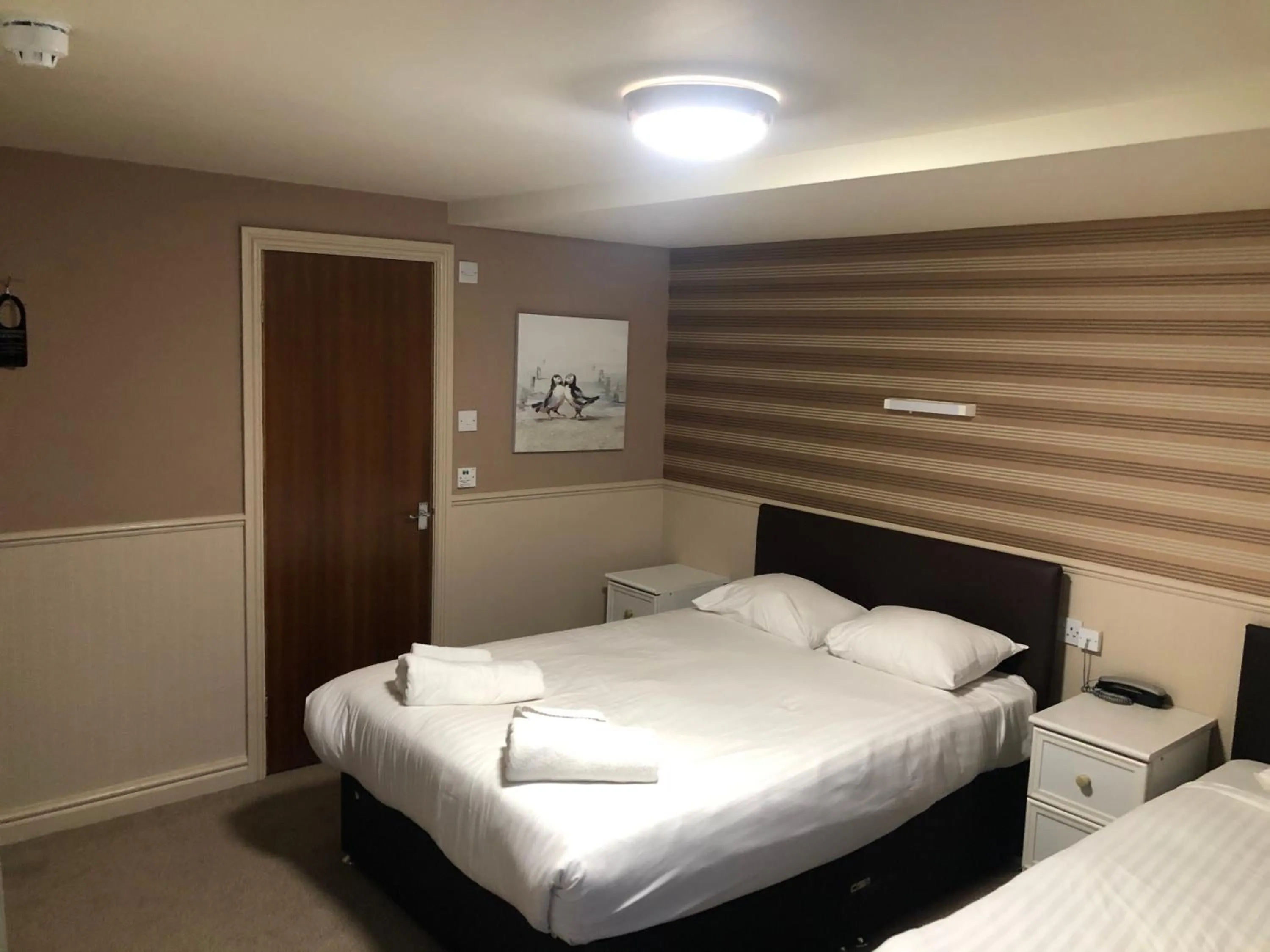 Bed in Lyndene Hotel