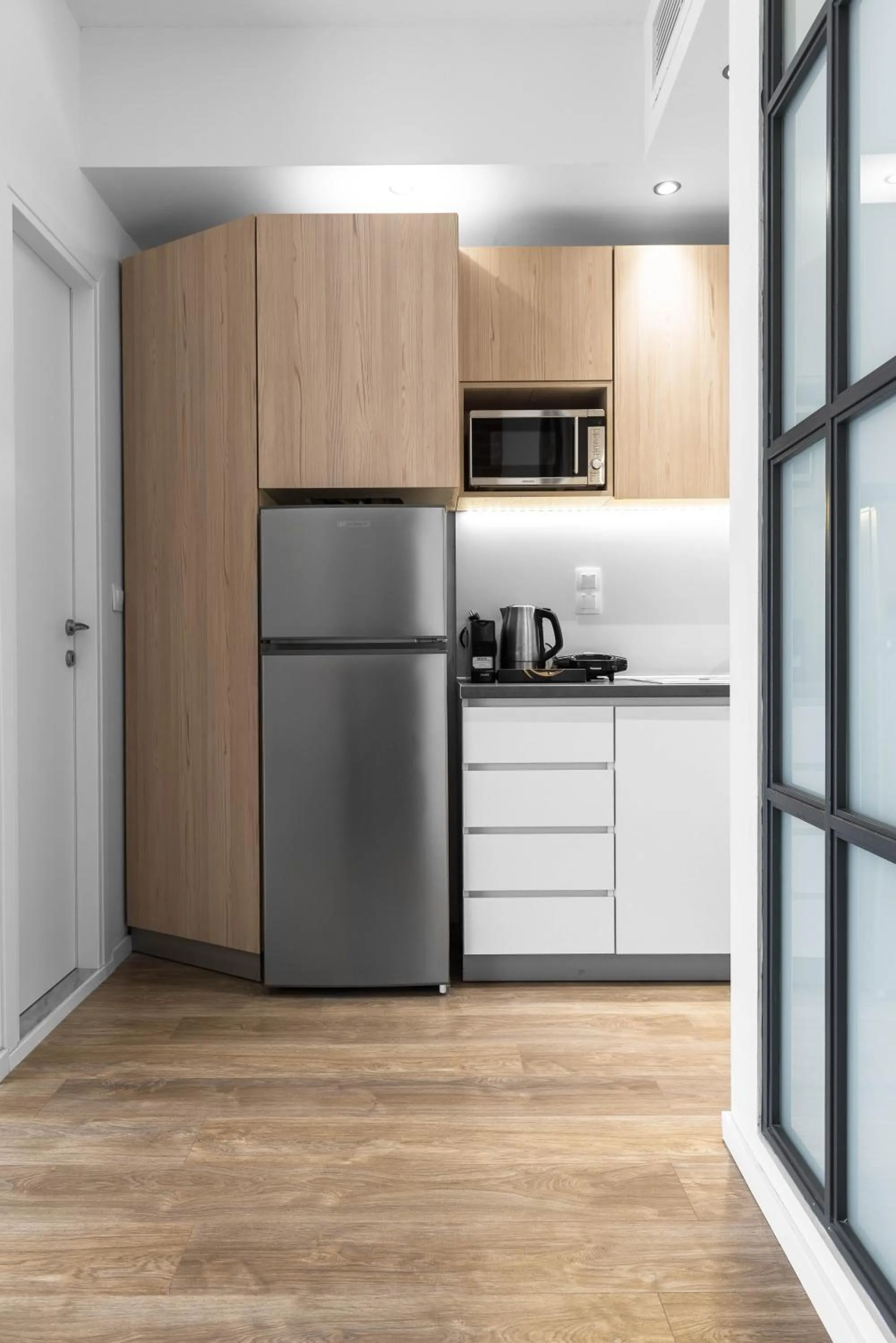 Kitchen or kitchenette in DeniZen Boutique Apartments, Nilie Hospitality MGMT