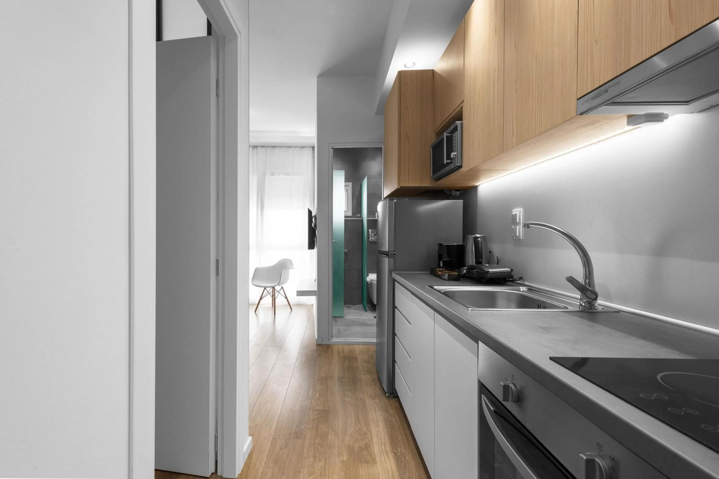 Kitchen or kitchenette in DeniZen Boutique Apartments, Nilie Hospitality MGMT