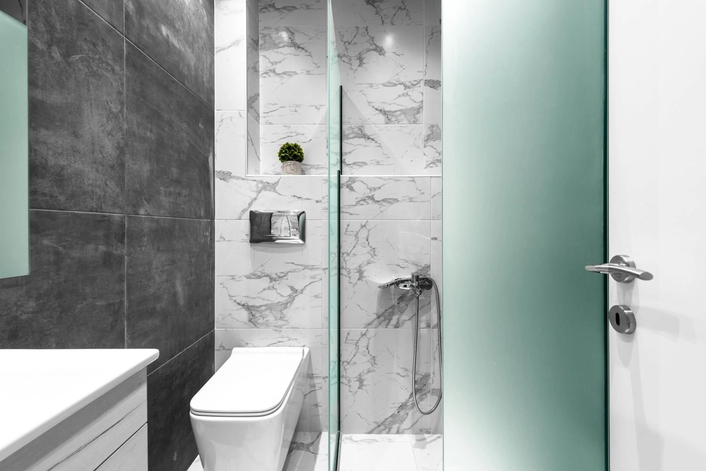 Shower in DeniZen Boutique Apartments, Nilie Hospitality MGMT