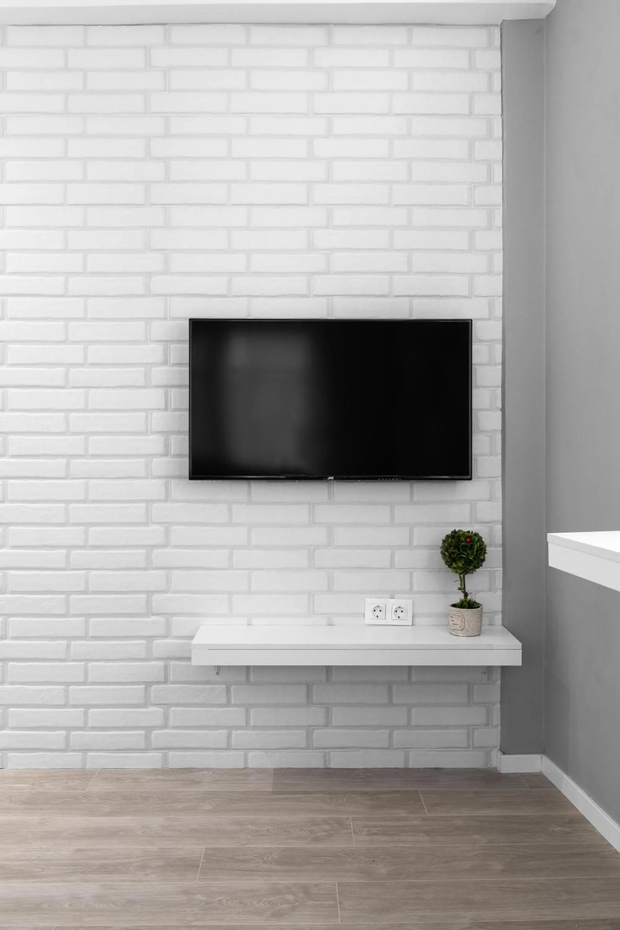 TV and multimedia in DeniZen Boutique Apartments, Nilie Hospitality MGMT