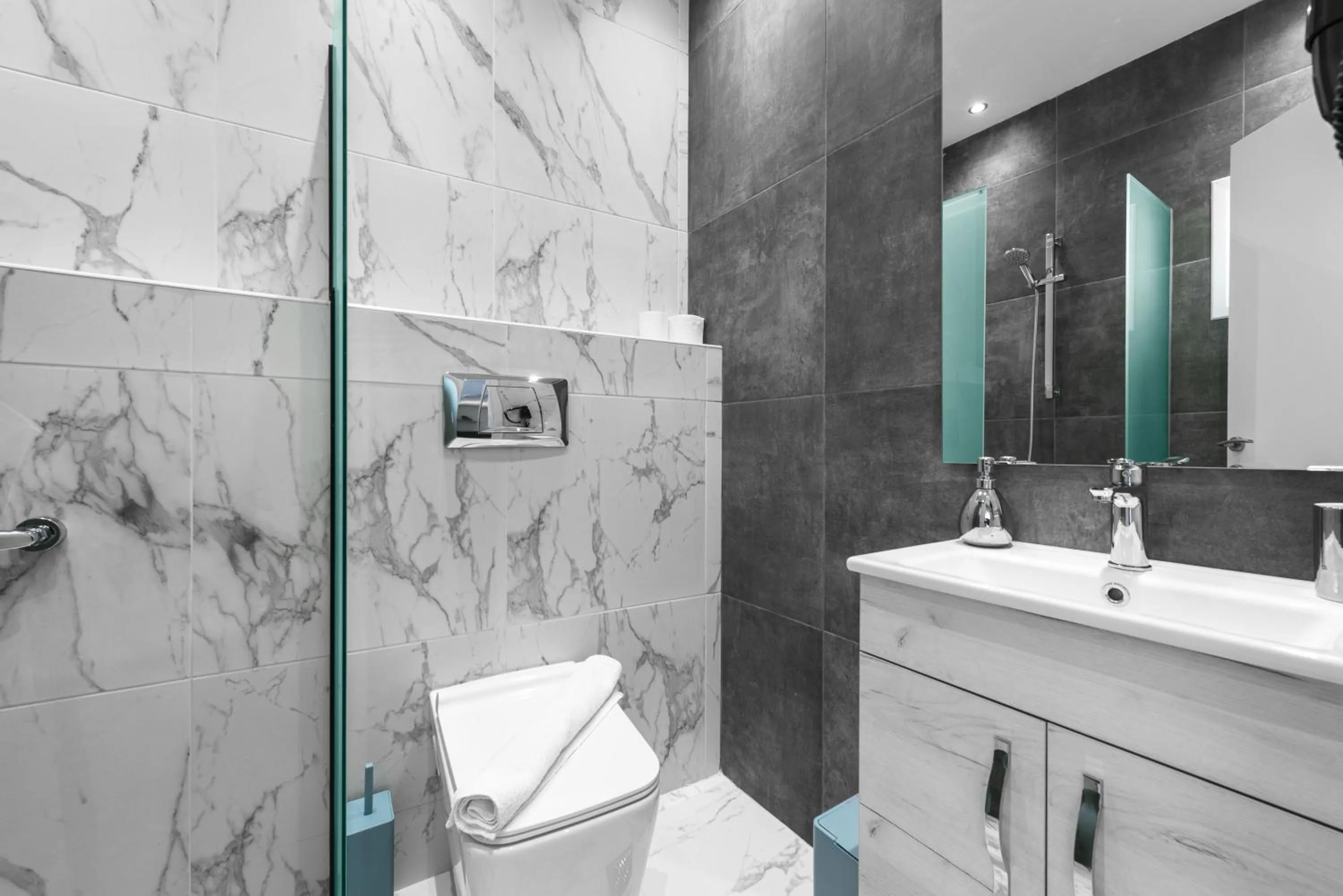 Shower in DeniZen Boutique Apartments, Nilie Hospitality MGMT