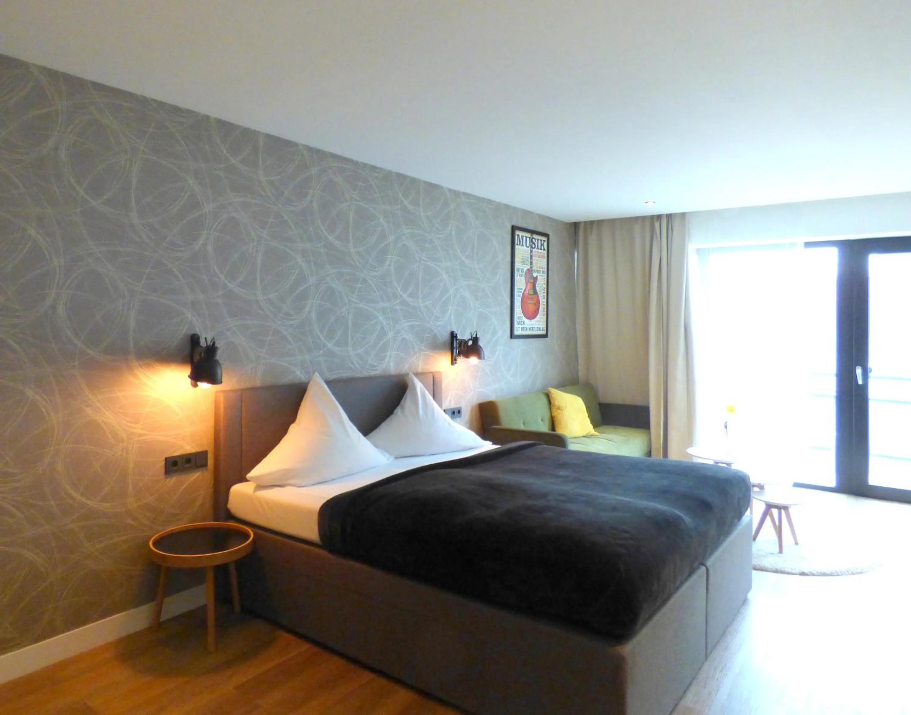 Bed in Niteroom Boutiquehotel & Apartements