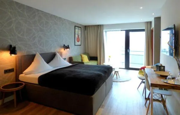 Bed in Niteroom Boutiquehotel & Apartements