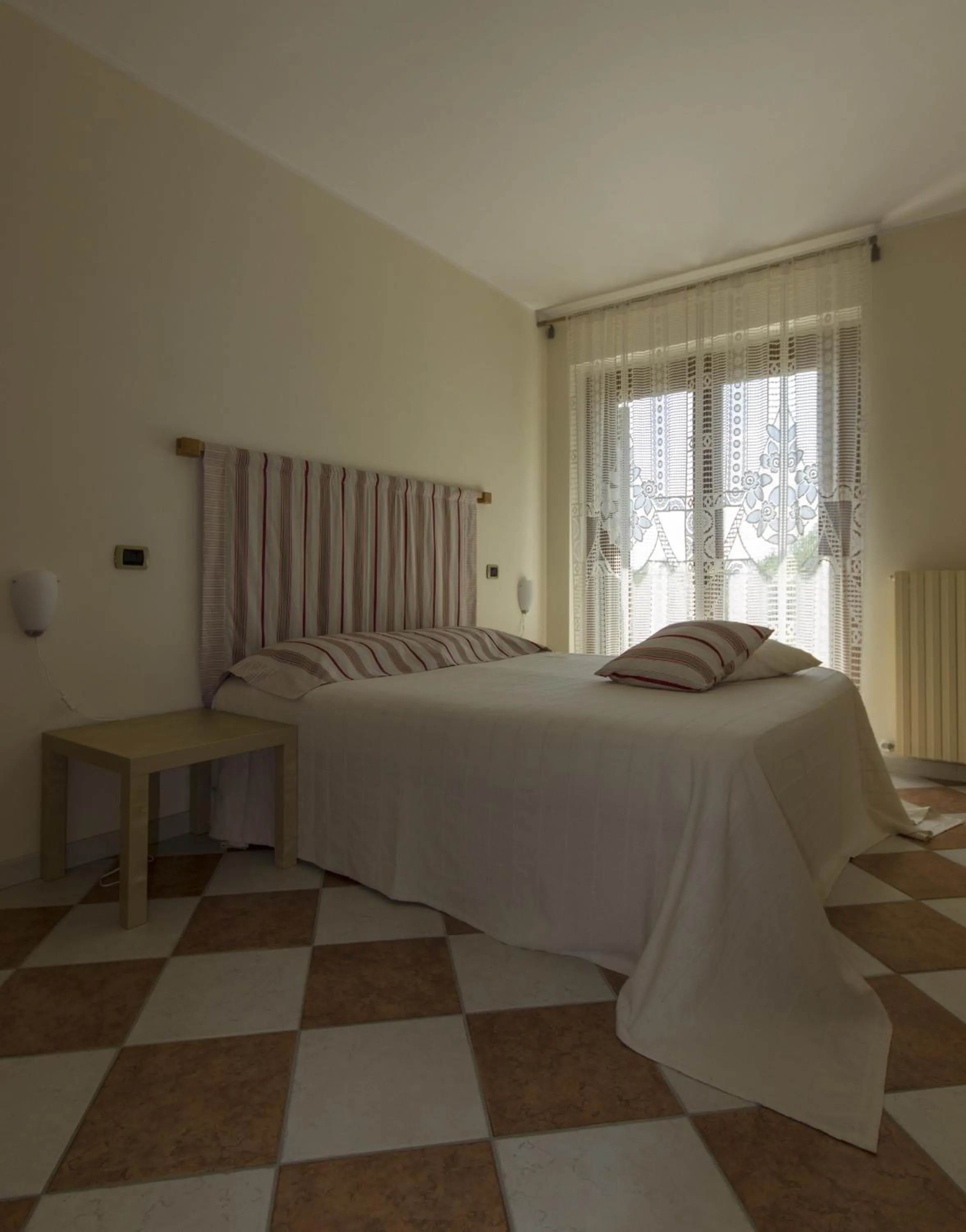 Bedroom, Bed in Appartamento Mimosa