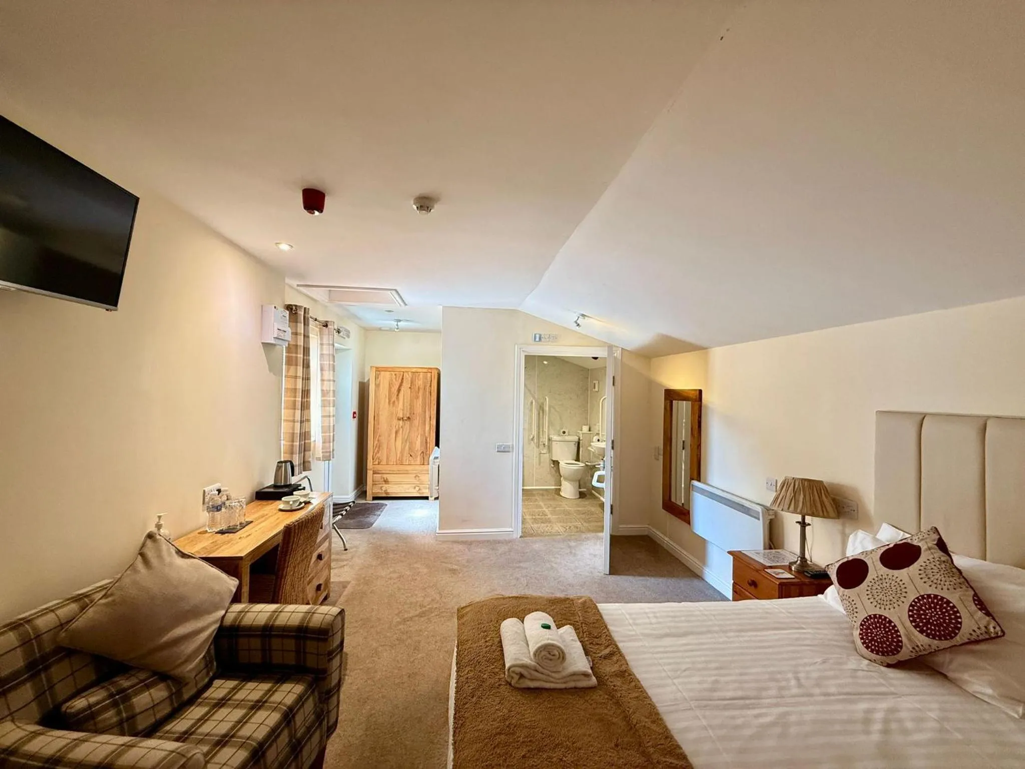 Bed in The Woodman Inn