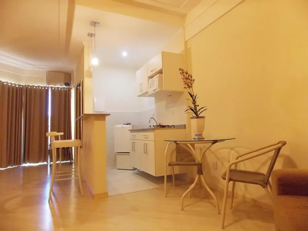 Kitchen or kitchenette in Itajubá Flat Hotel