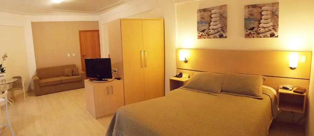 wardrobe, Bed in Itajubá Flat Hotel