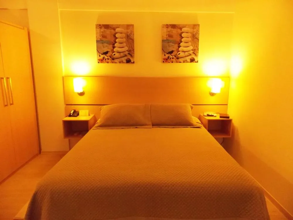 Bed in Itajubá Flat Hotel