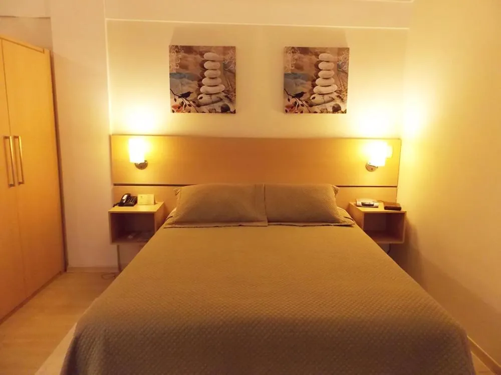 Bed in Itajubá Flat Hotel