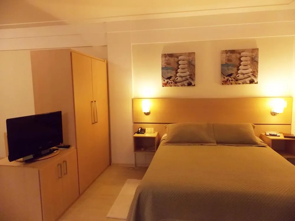 Photo of the whole room, Bed in Itajubá Flat Hotel