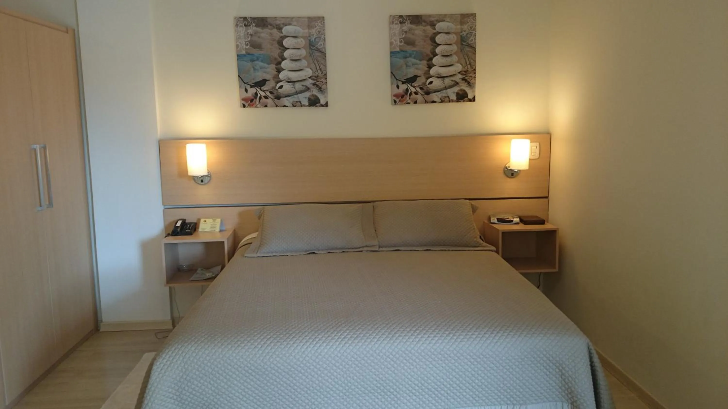 Bed in Itajubá Flat Hotel