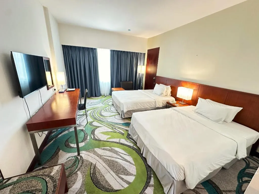 Bed in RH Hotel Sibu